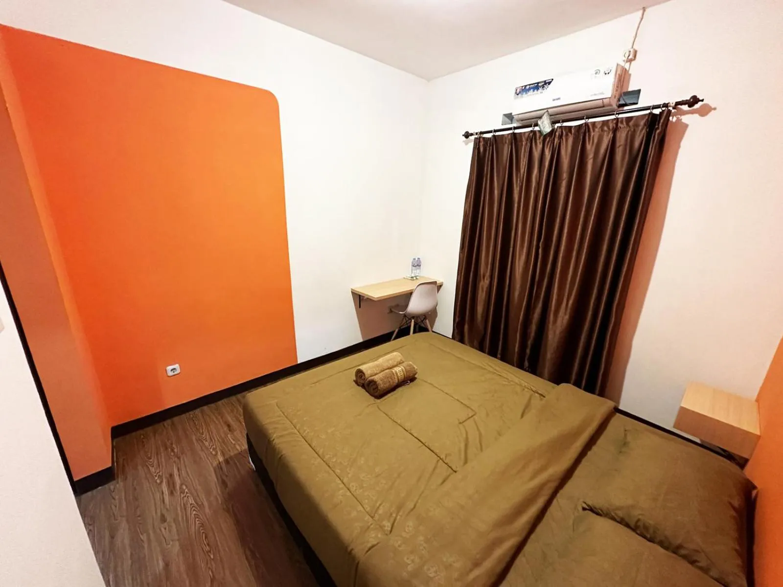 Bed in OYO 1608 Feby Maisonatte