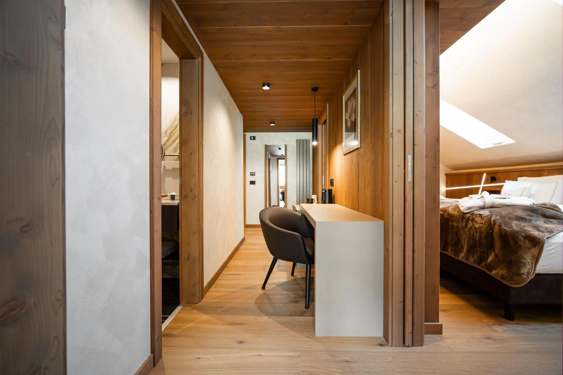 Bed in Sertorelli Sporthotel