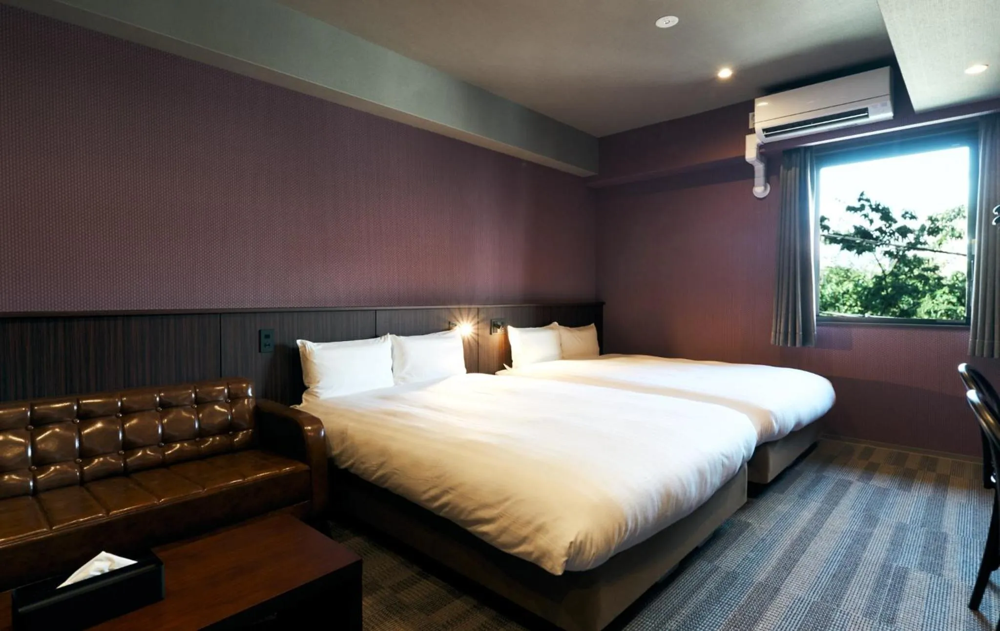 Bed in Rakuten STAY Kokura Station Standard Twin Room with counter table