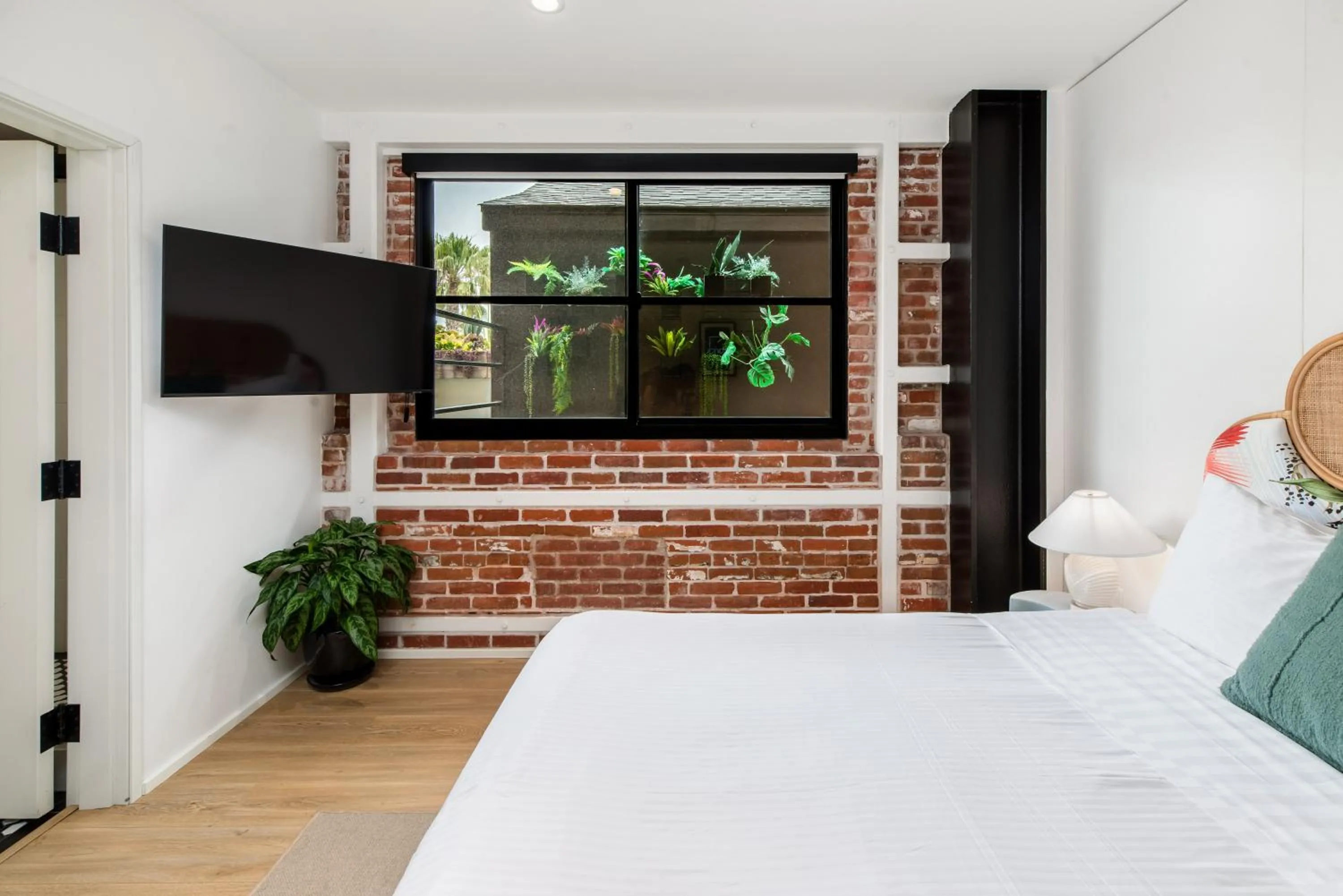 Bed in The Brick Boutique Hotel