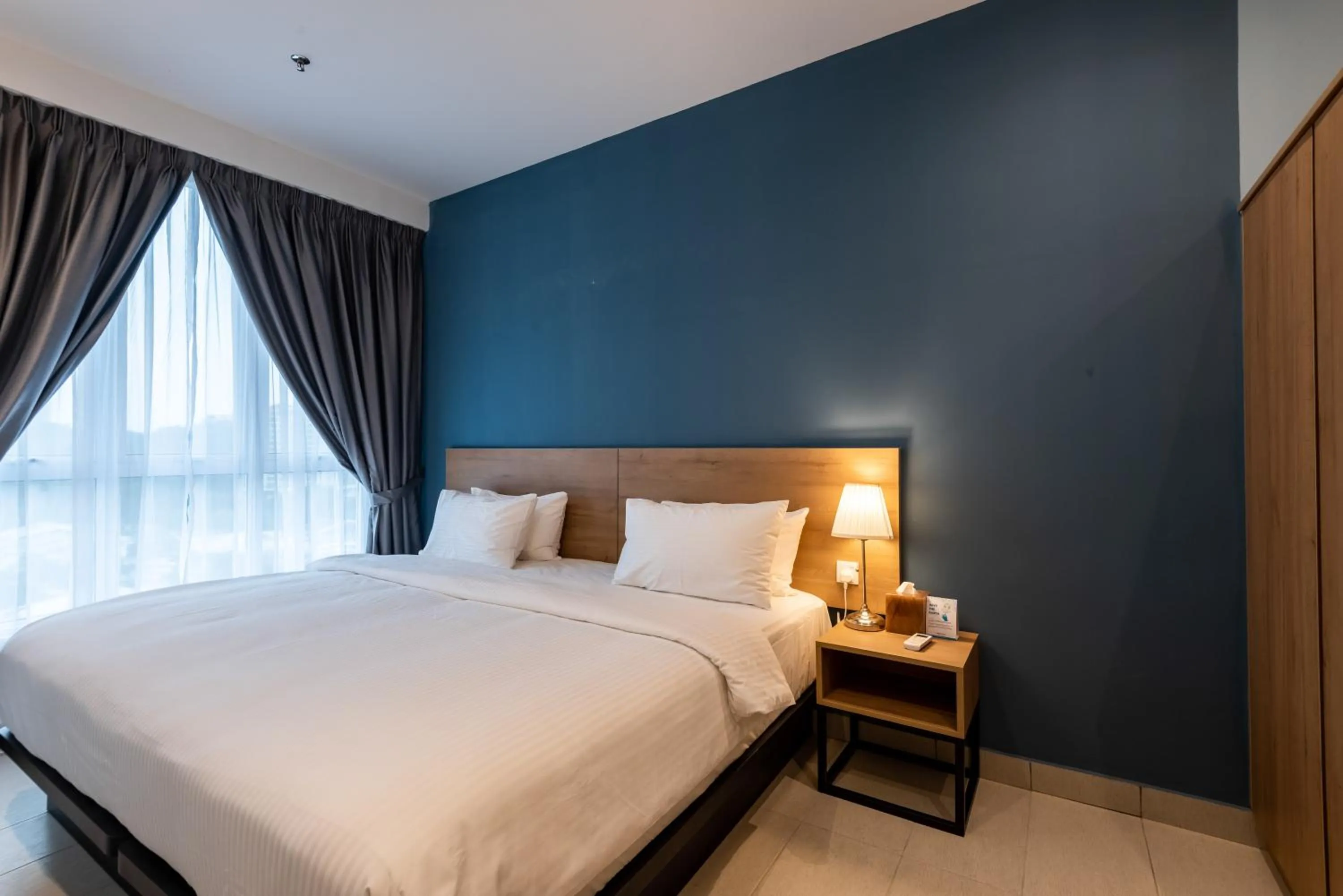 Bed in The Signature Serviced Suites & Office Puchong