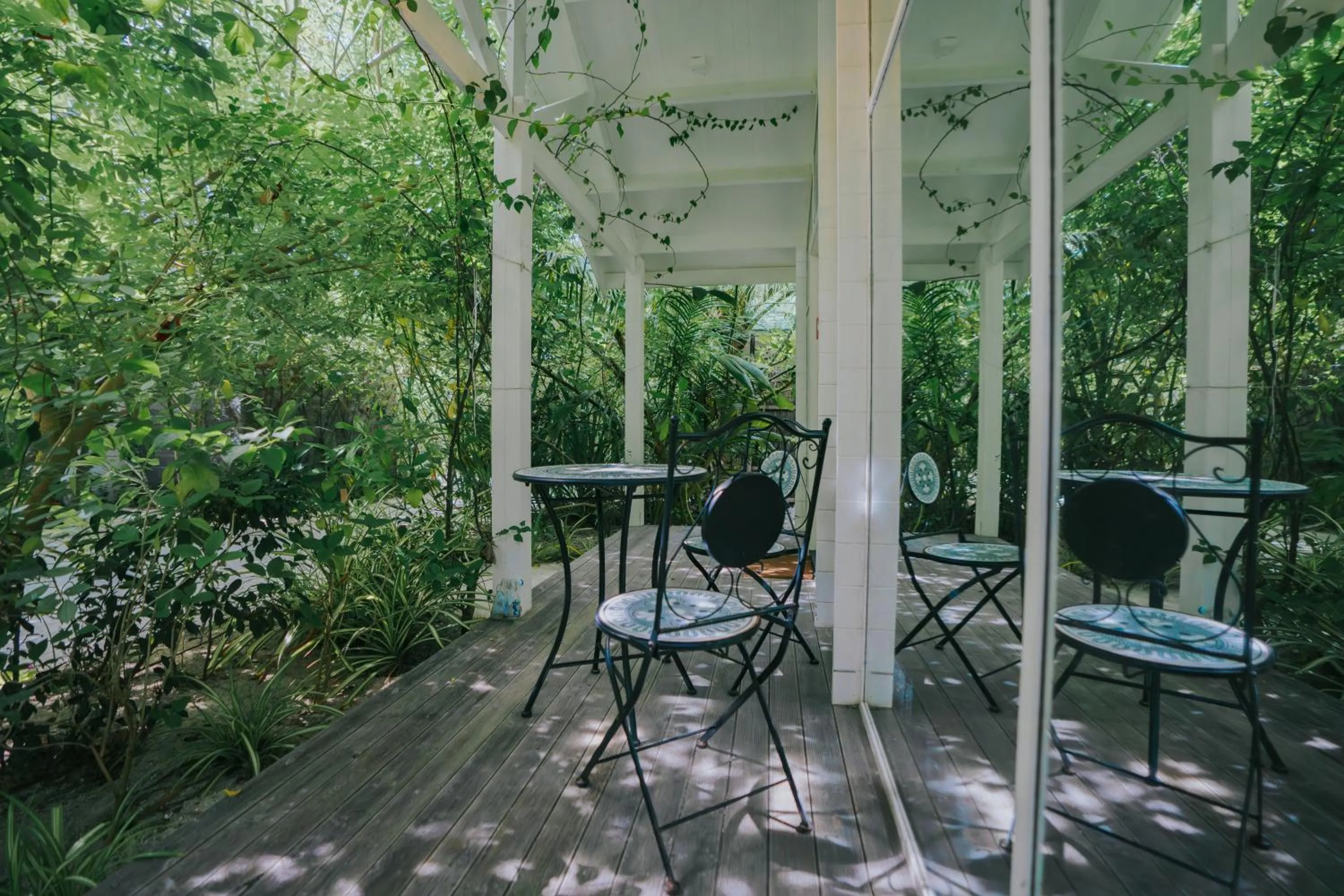 Patio in Oaga Art Resort Maldives - Greatest All Inclusive Plan with Free Speedboat Round-trip