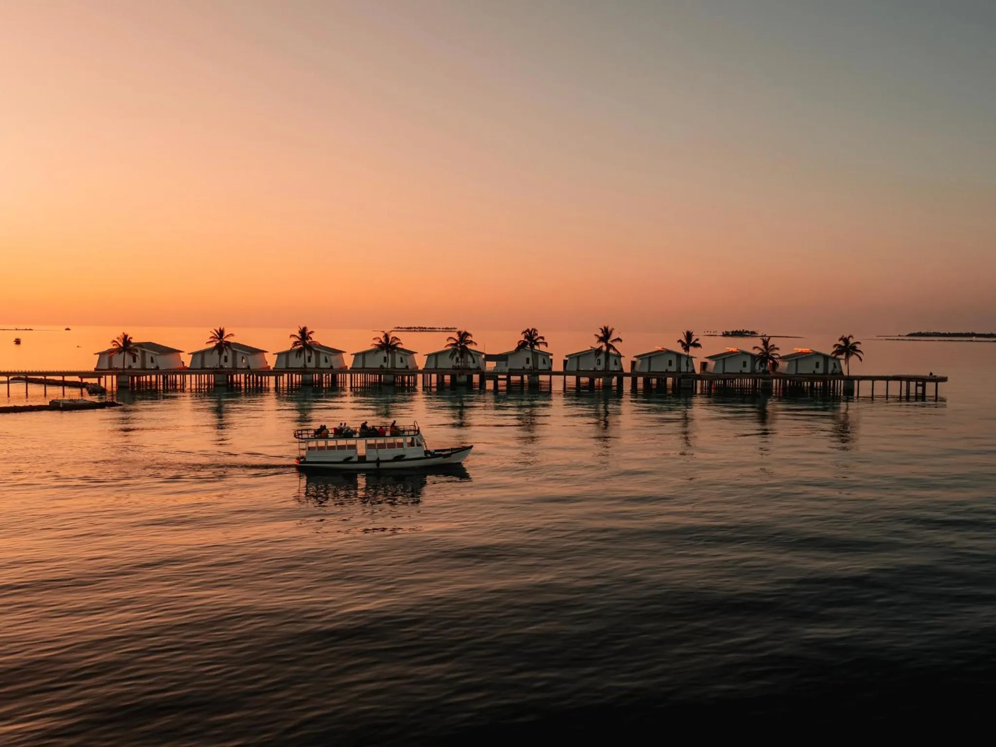 Sunset in Oaga Art Resort Maldives - Greatest All Inclusive Plan with Free Speedboat Round-trip