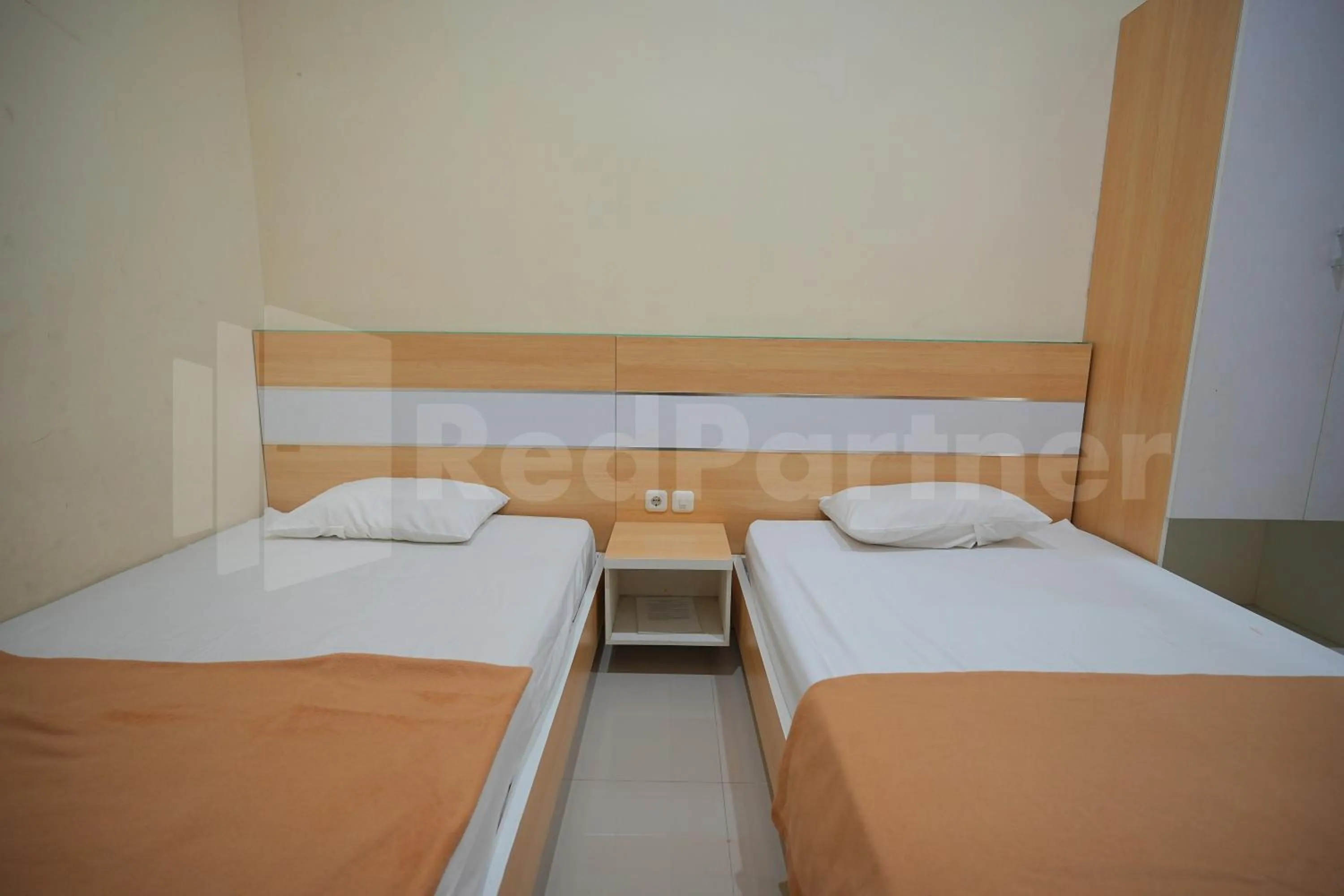 Bedroom, Bed in One & Quin Guest House Syariah Mitra RedDoorz