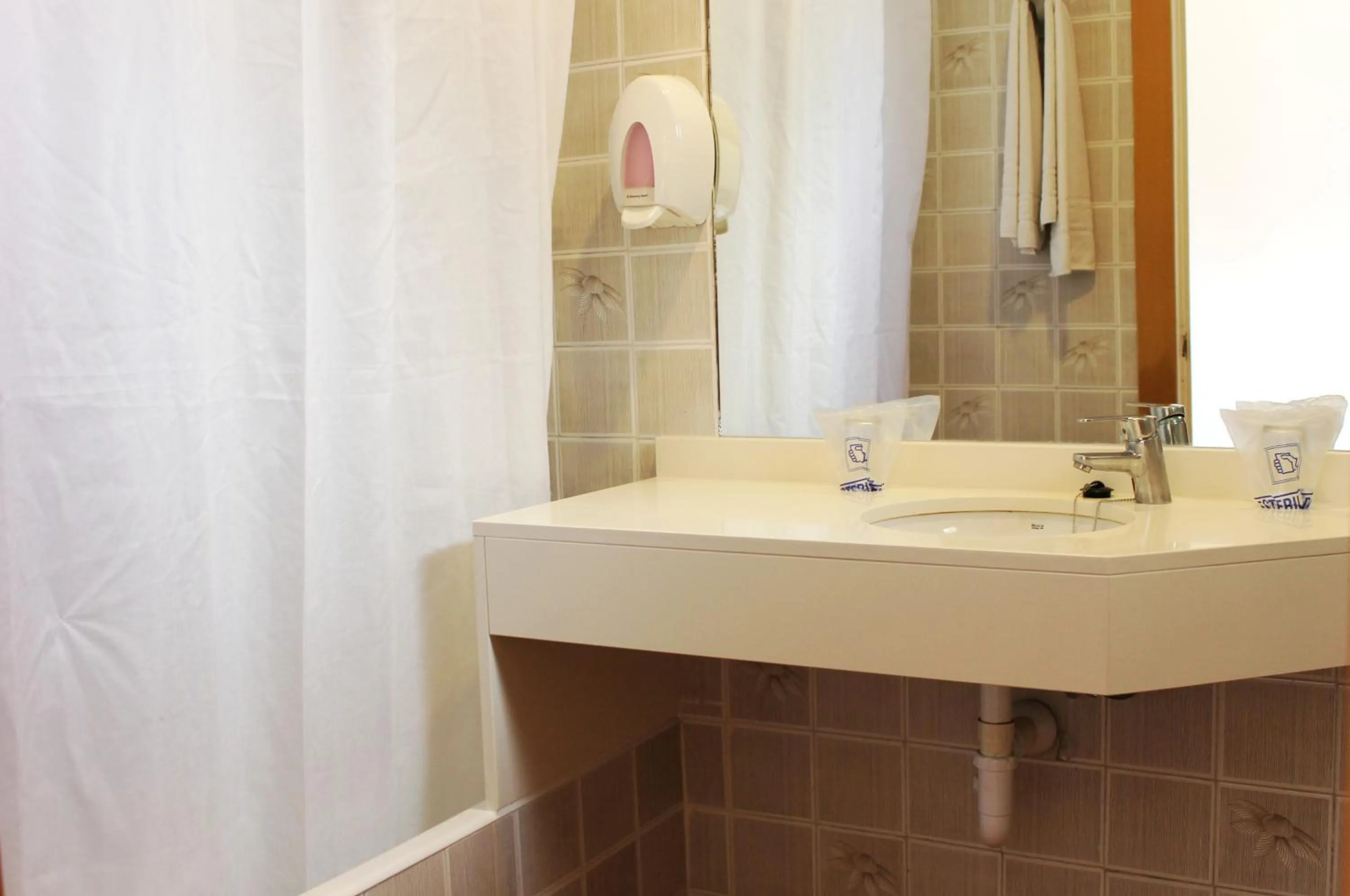 Bathroom in Hotel Amic Colon