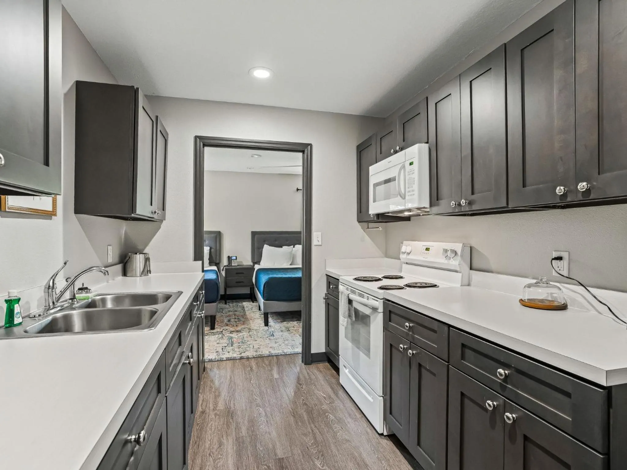 Kitchen or kitchenette in Baymont by Wyndham Ocala Suites