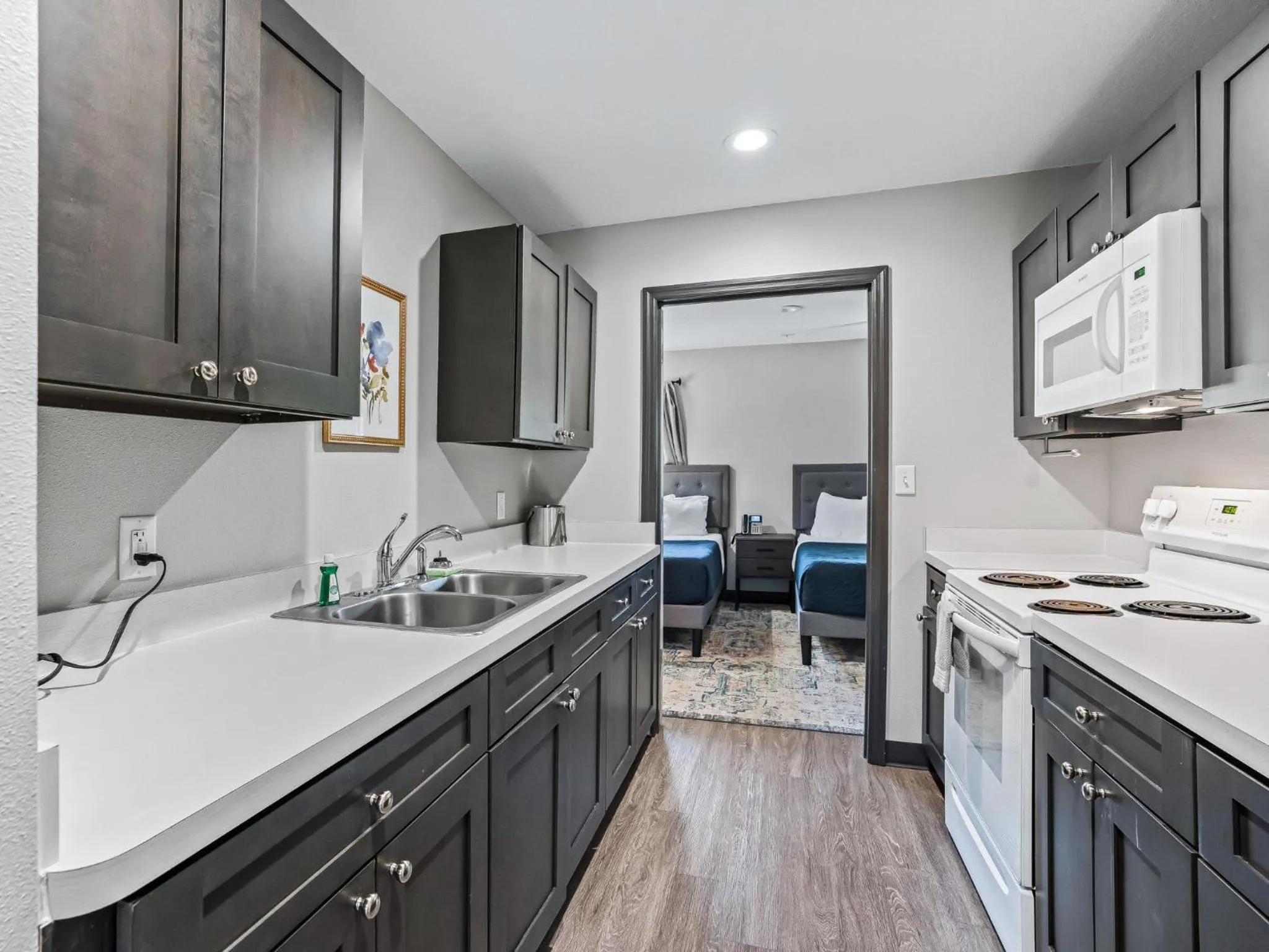 Kitchen or kitchenette in Baymont by Wyndham Ocala Suites