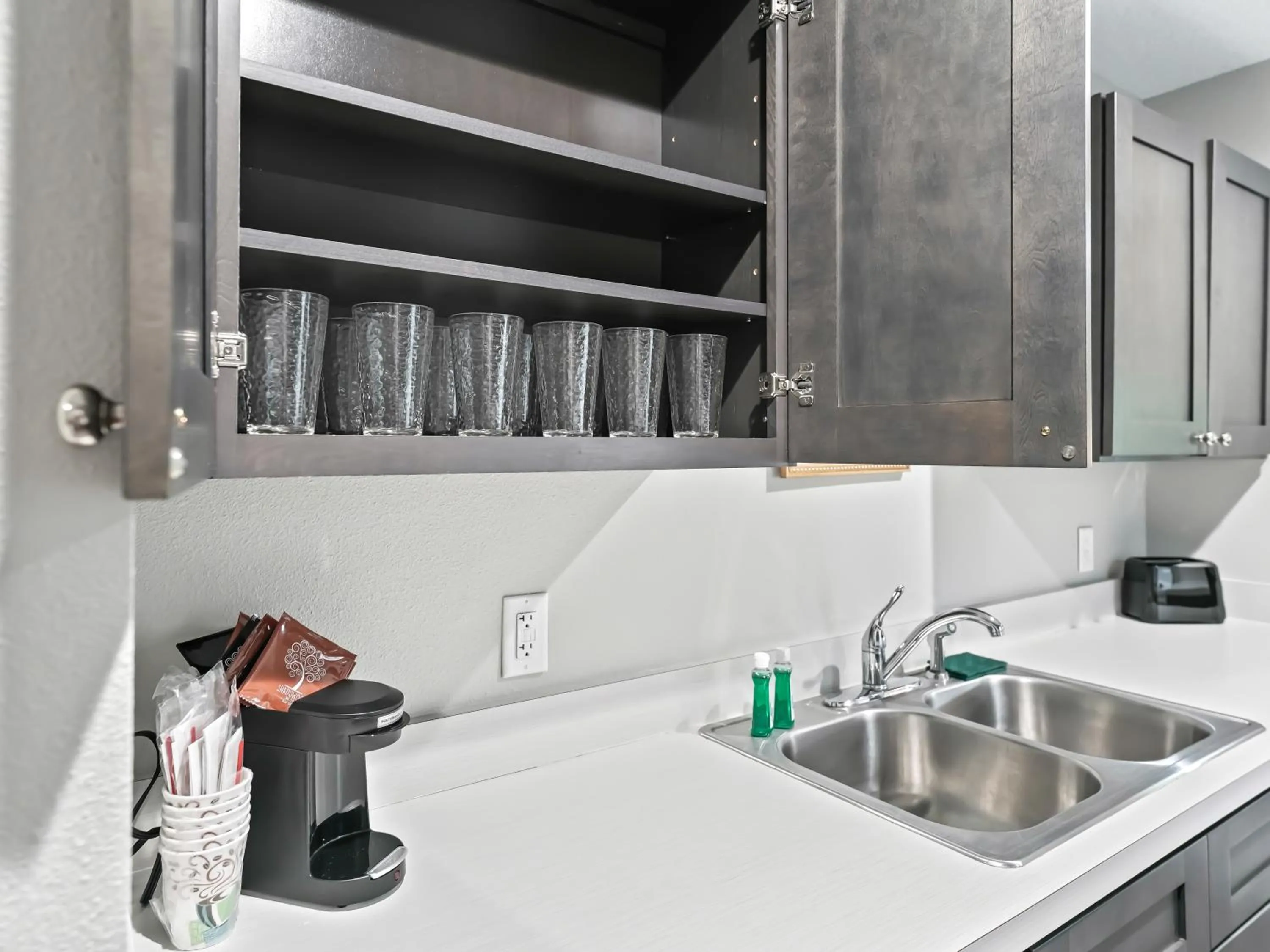 Kitchen or kitchenette in Baymont by Wyndham Ocala Suites
