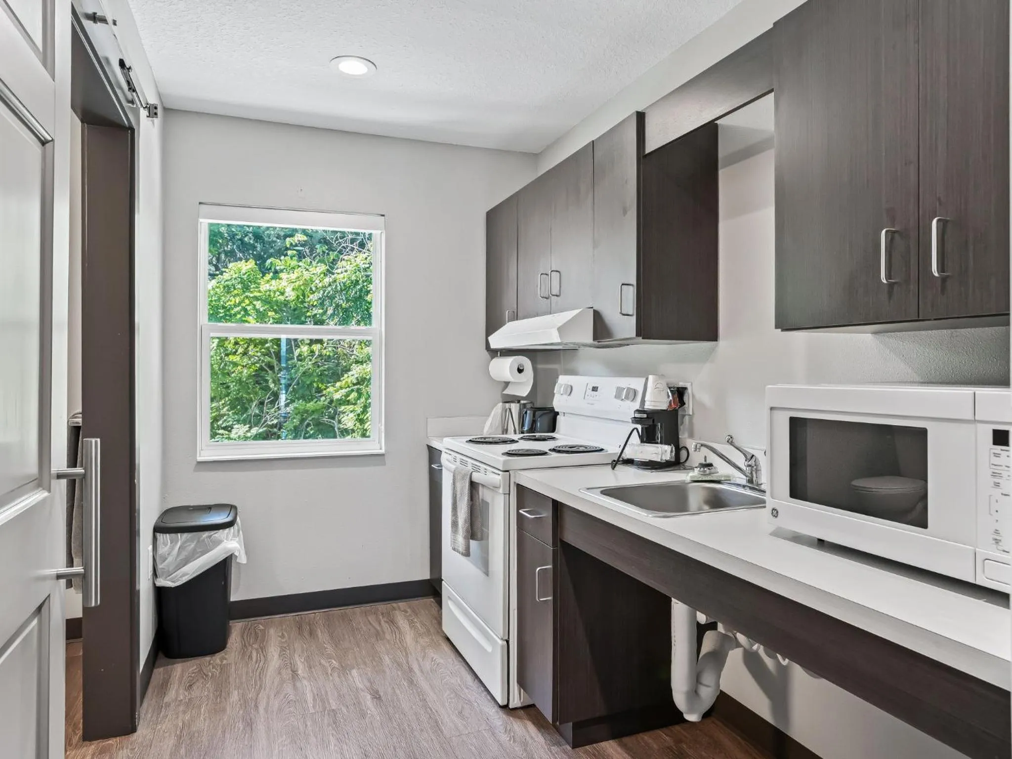 Kitchen or kitchenette in Baymont by Wyndham Ocala Suites