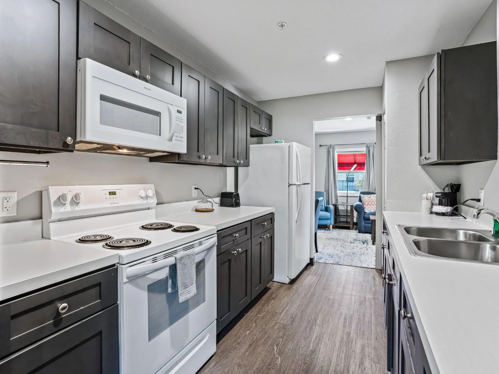 Kitchen or kitchenette in Baymont by Wyndham Ocala Suites