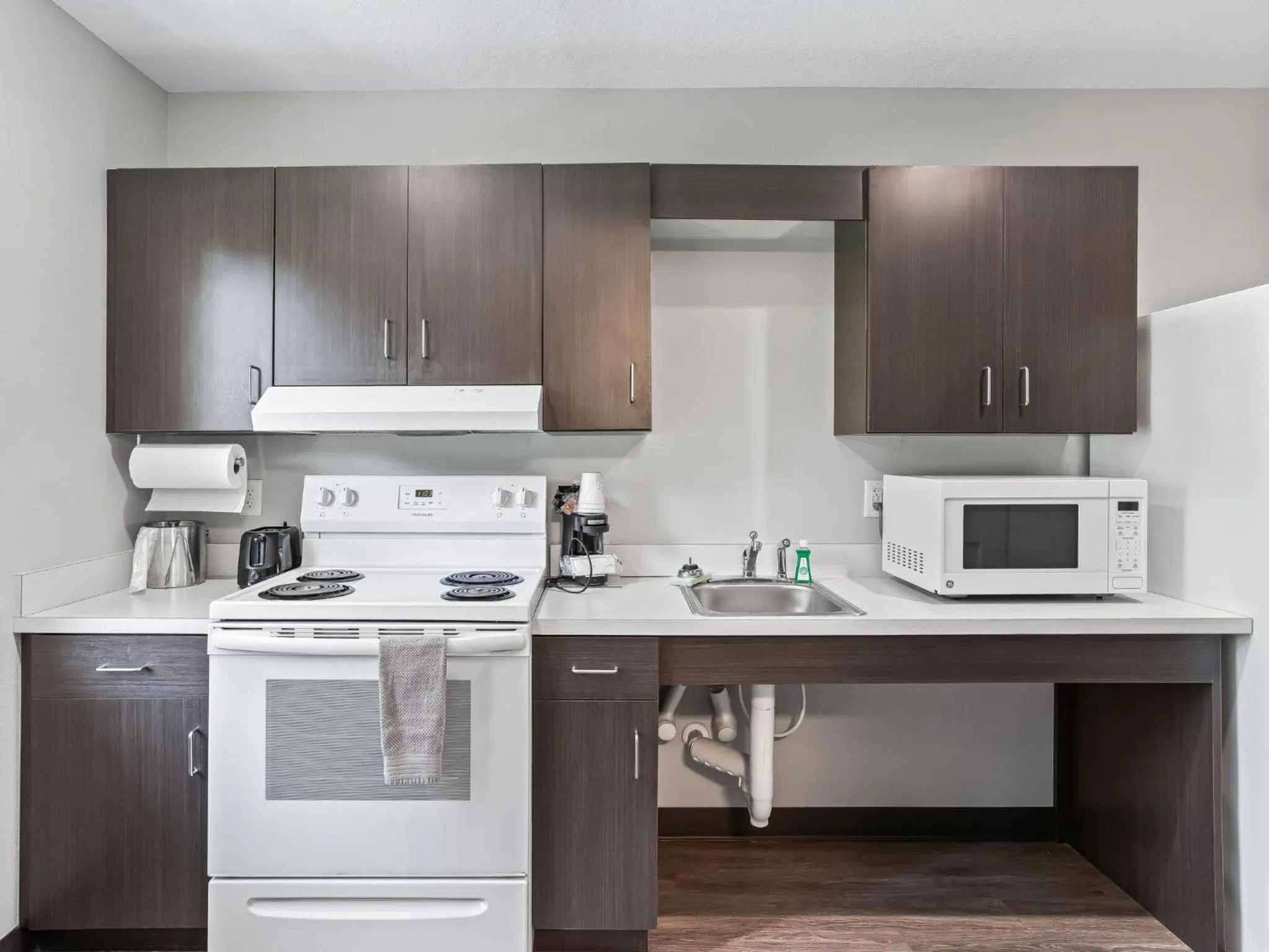 Kitchen or kitchenette in Baymont by Wyndham Ocala Suites