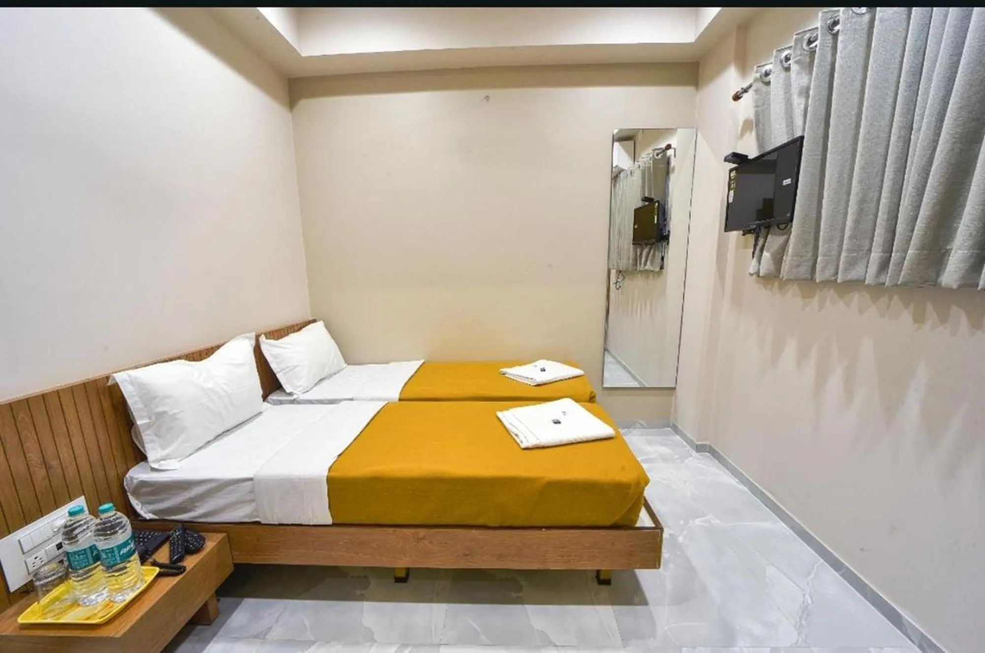 Bedroom, Bed in Hotel TrushaDham Near to Mahalaxmi Temple Kolhapur