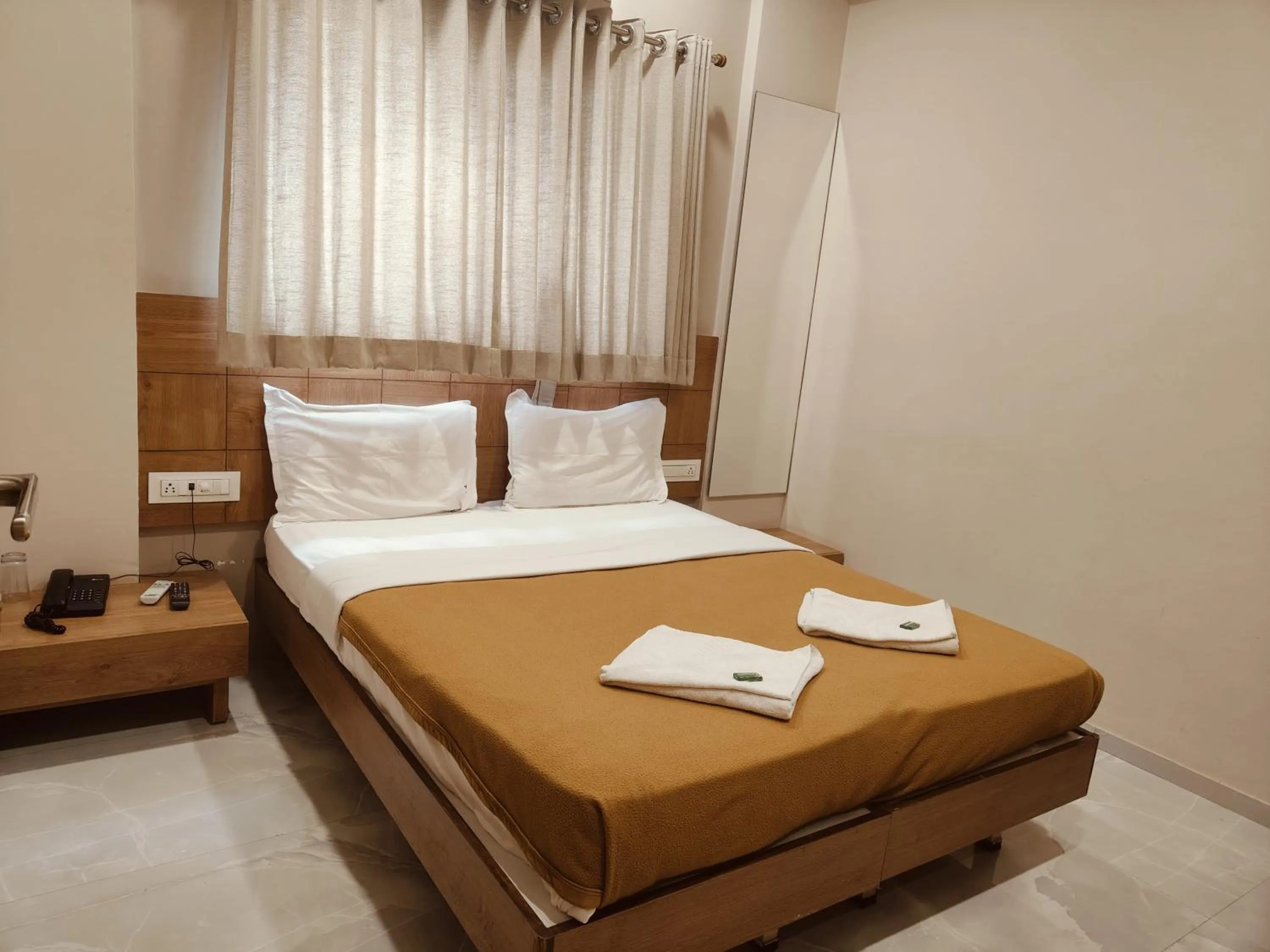 Bed in Hotel TrushaDham Near to Mahalaxmi Temple Kolhapur