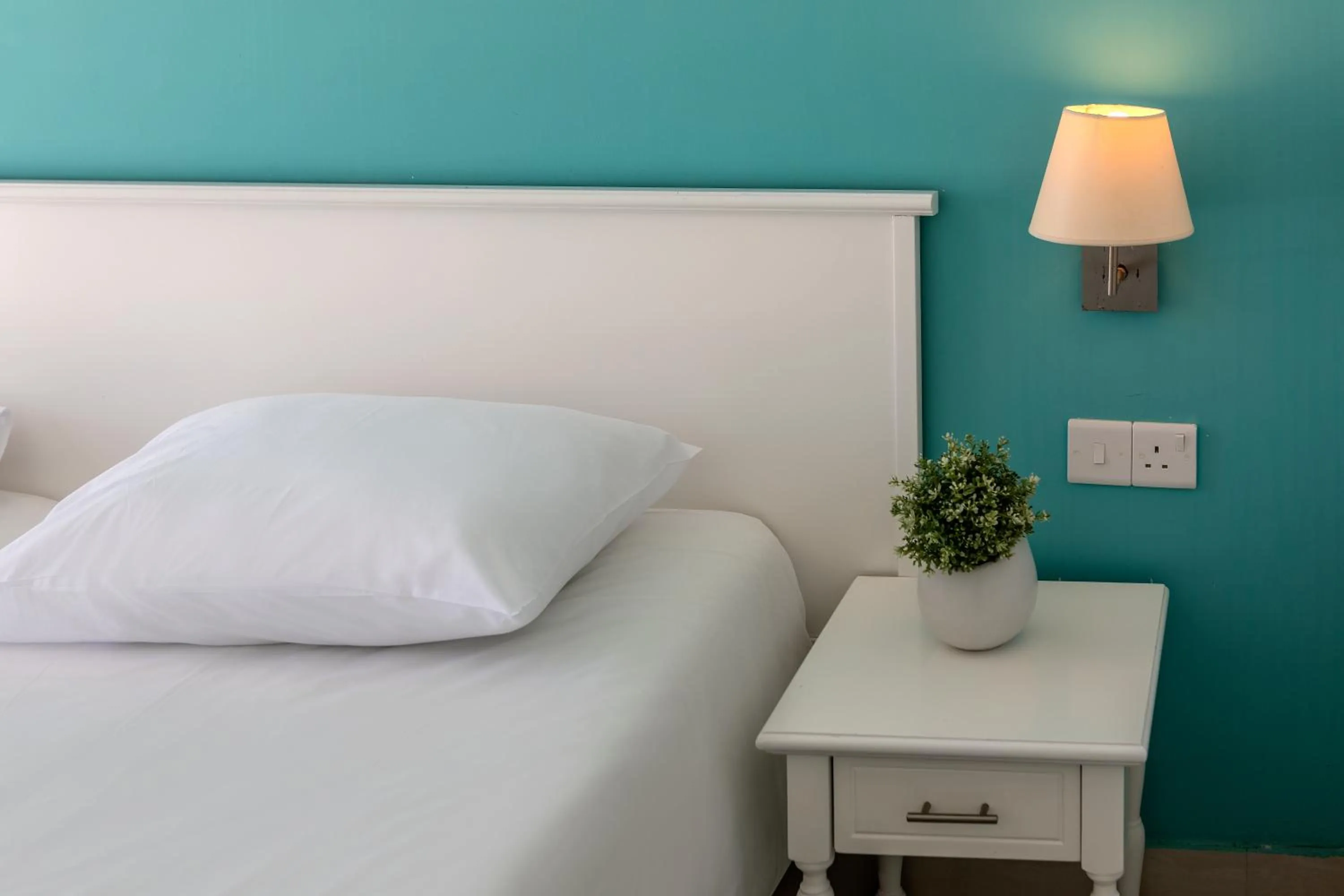 Bed in Mia Hotel Apartment