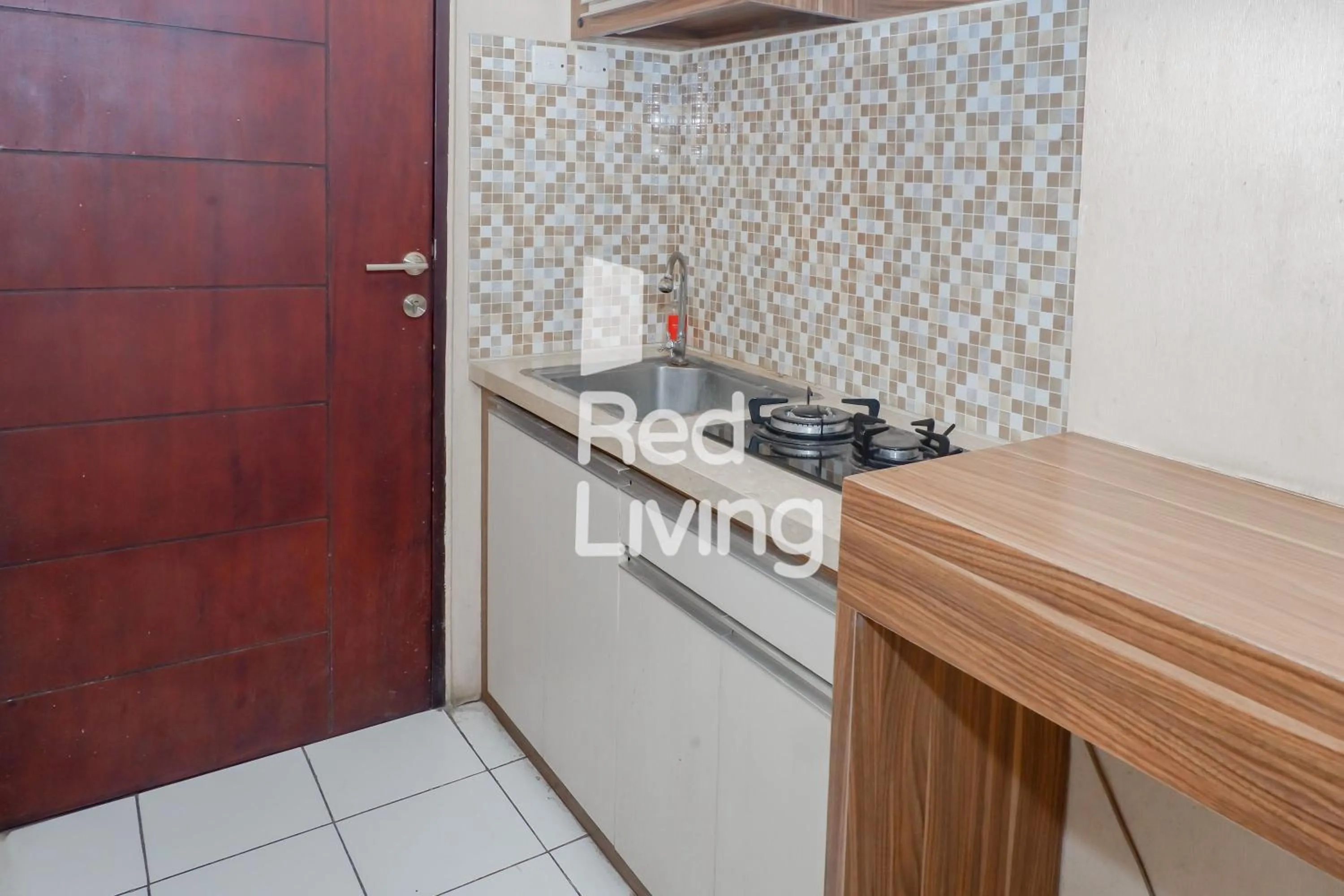 Kitchen or kitchenette in Redliving Apartemen Emerald Tower - Bion Apartel 2 Tower South