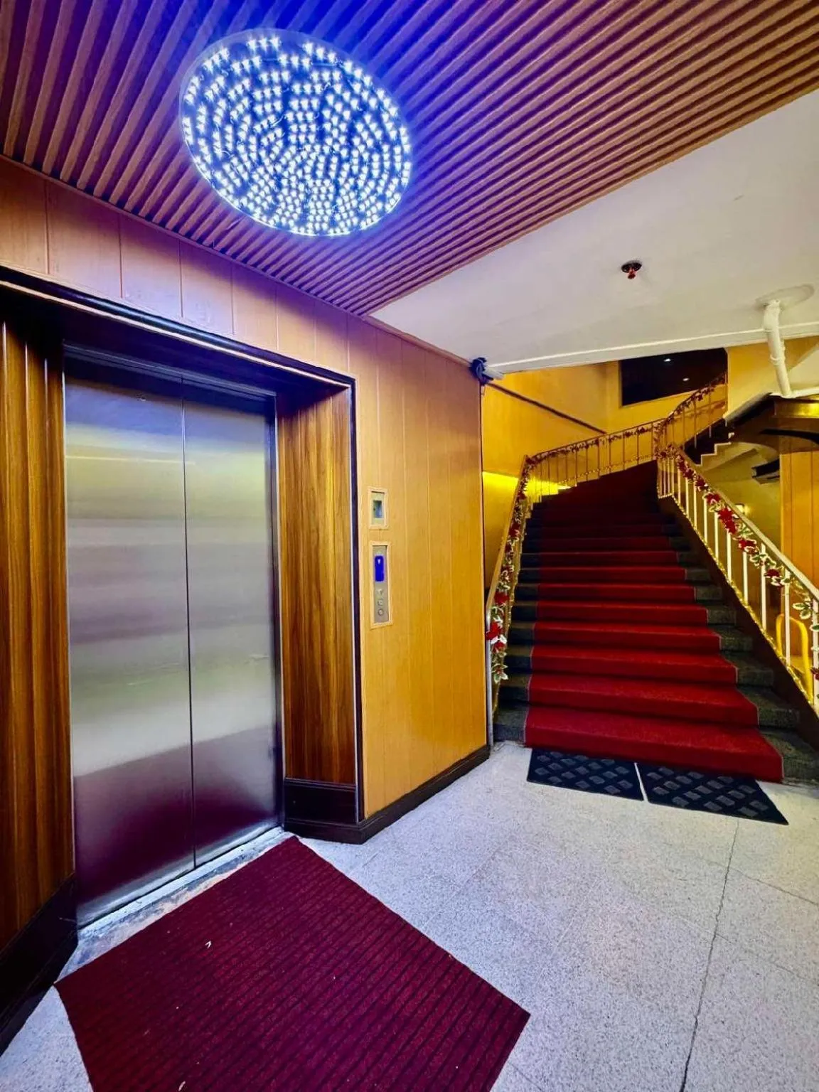 elevator in Comfy Inn Mabini Manila