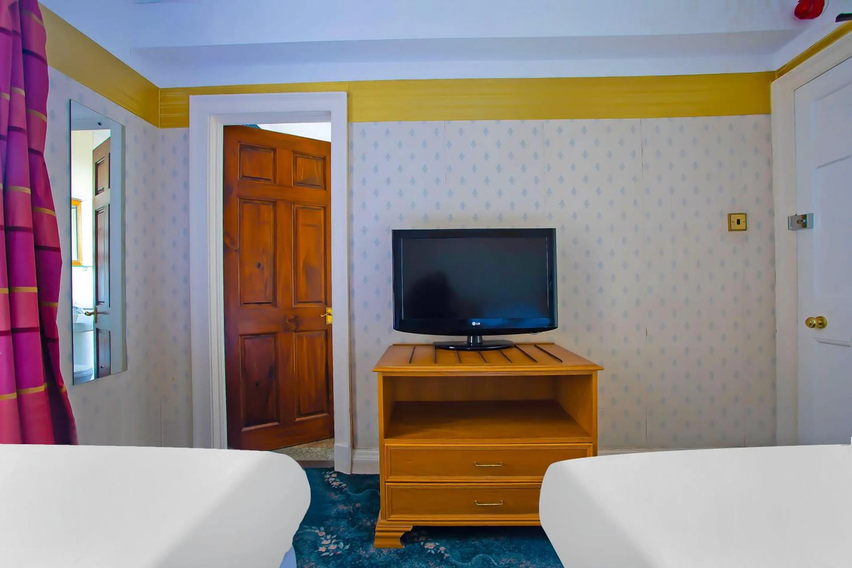 Bedroom in Great White Horse Hotel