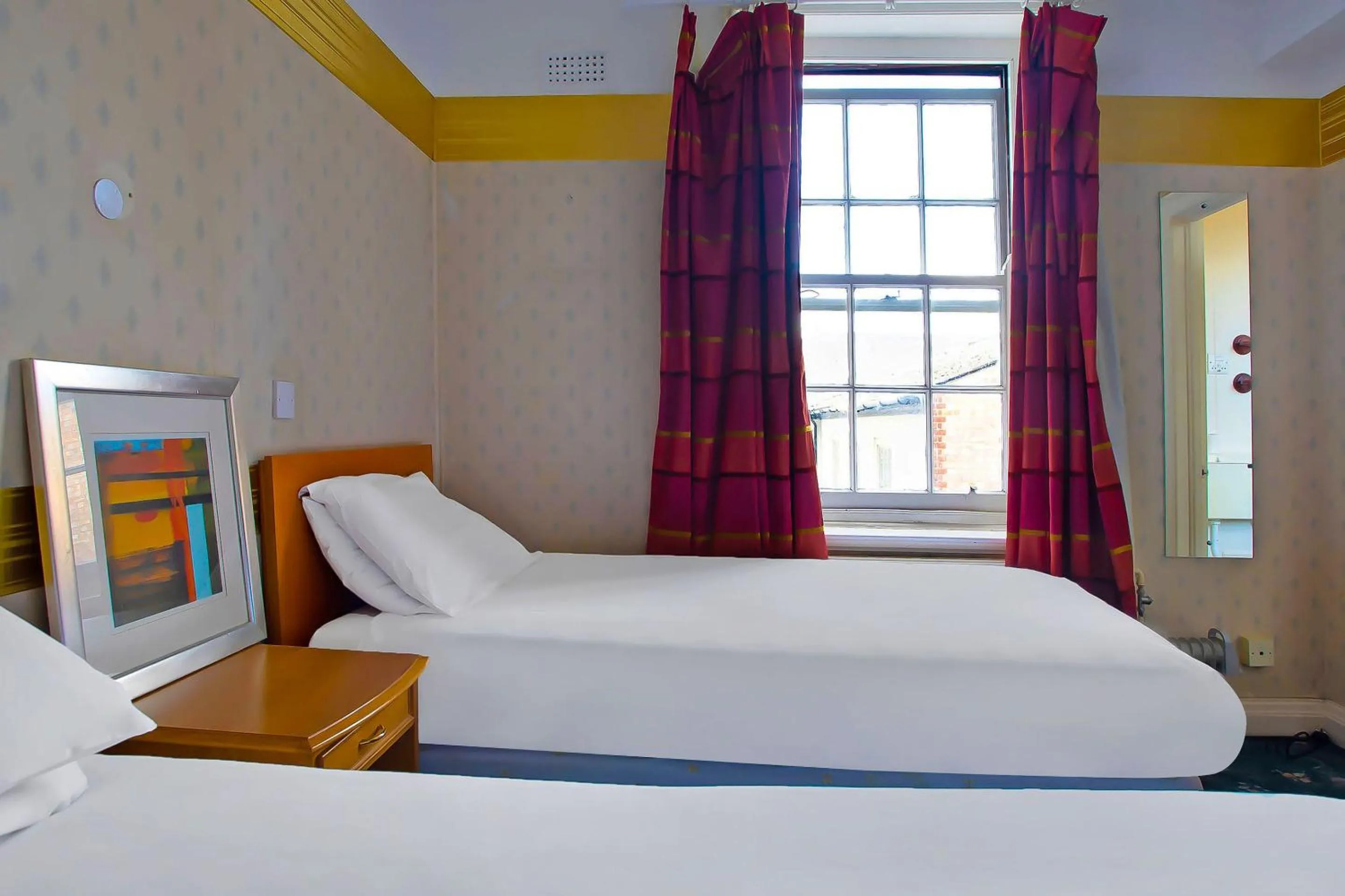 Bedroom in Great White Horse Hotel