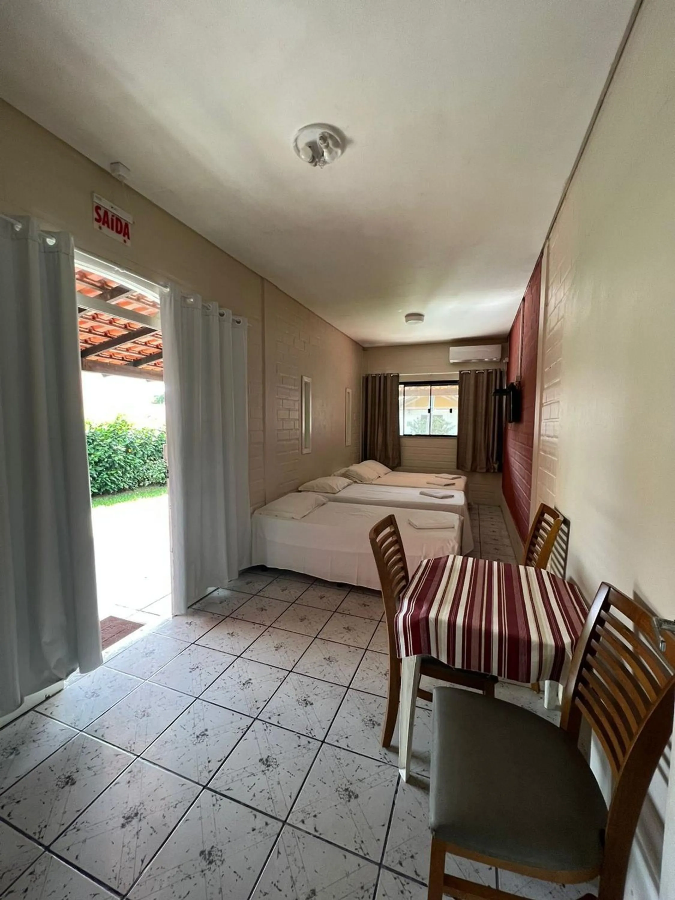 Bed in Recanto Armação Pousada