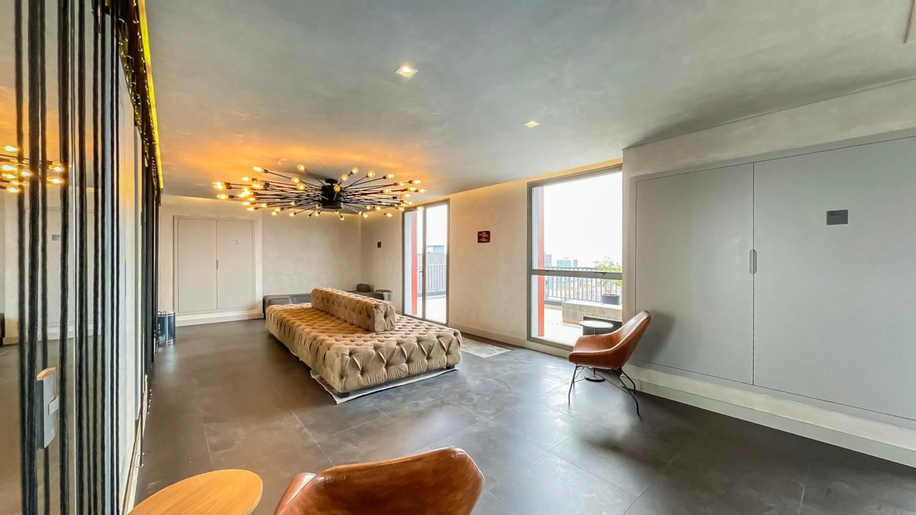 Seating area in 360 VN Turiassú by Housi