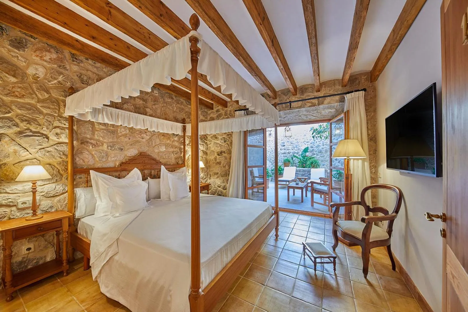 Patio, Bed in Cas Comte Suites & Spa - Adults Only