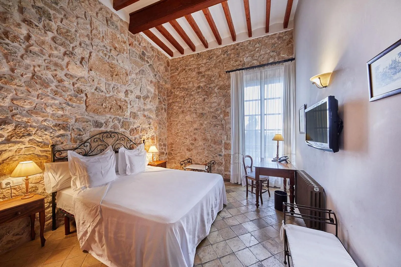 Photo of the whole room, Bed in Cas Comte Suites & Spa - Adults Only