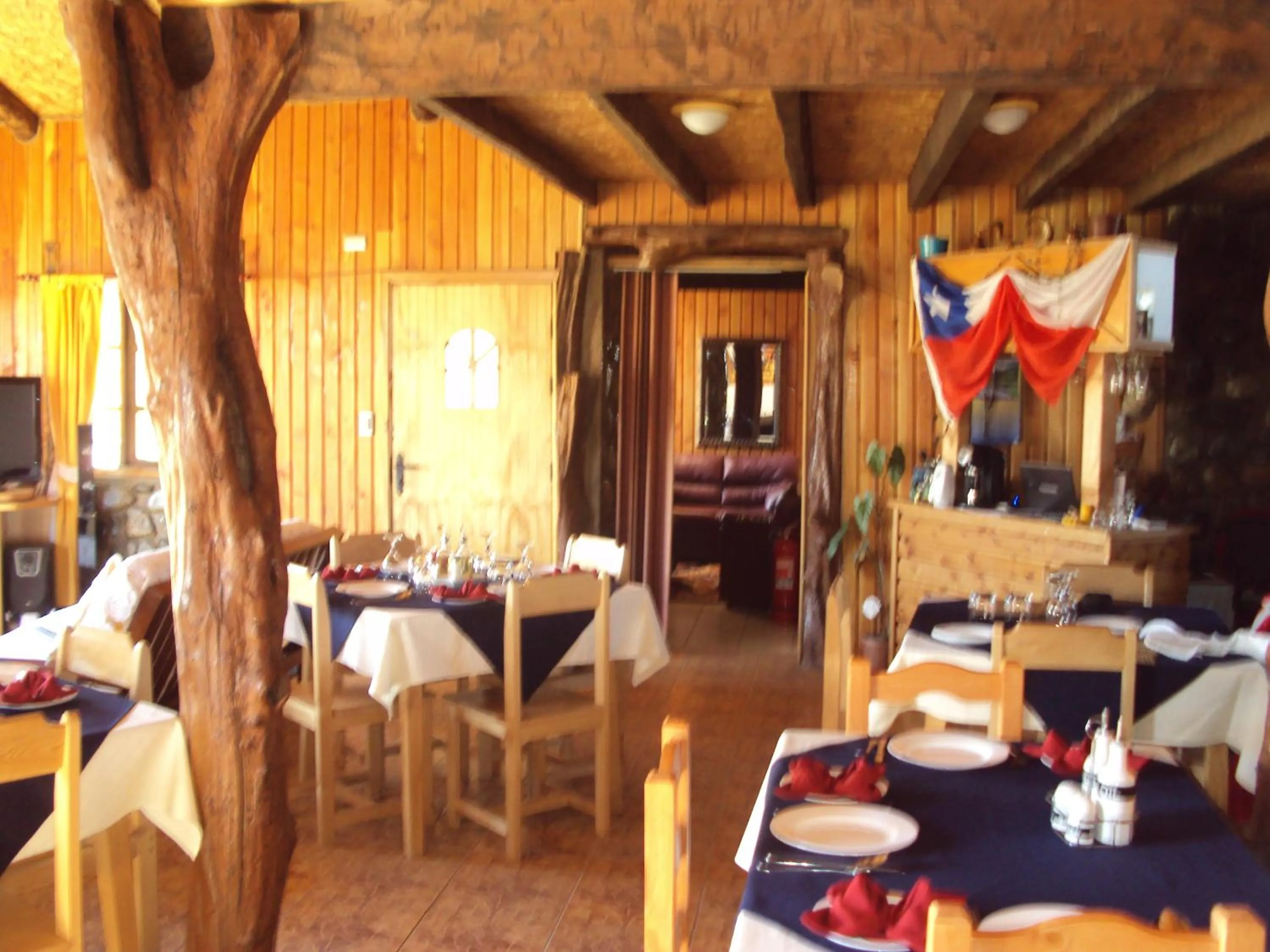 Communal lounge/ TV room in Hosteria Rayen