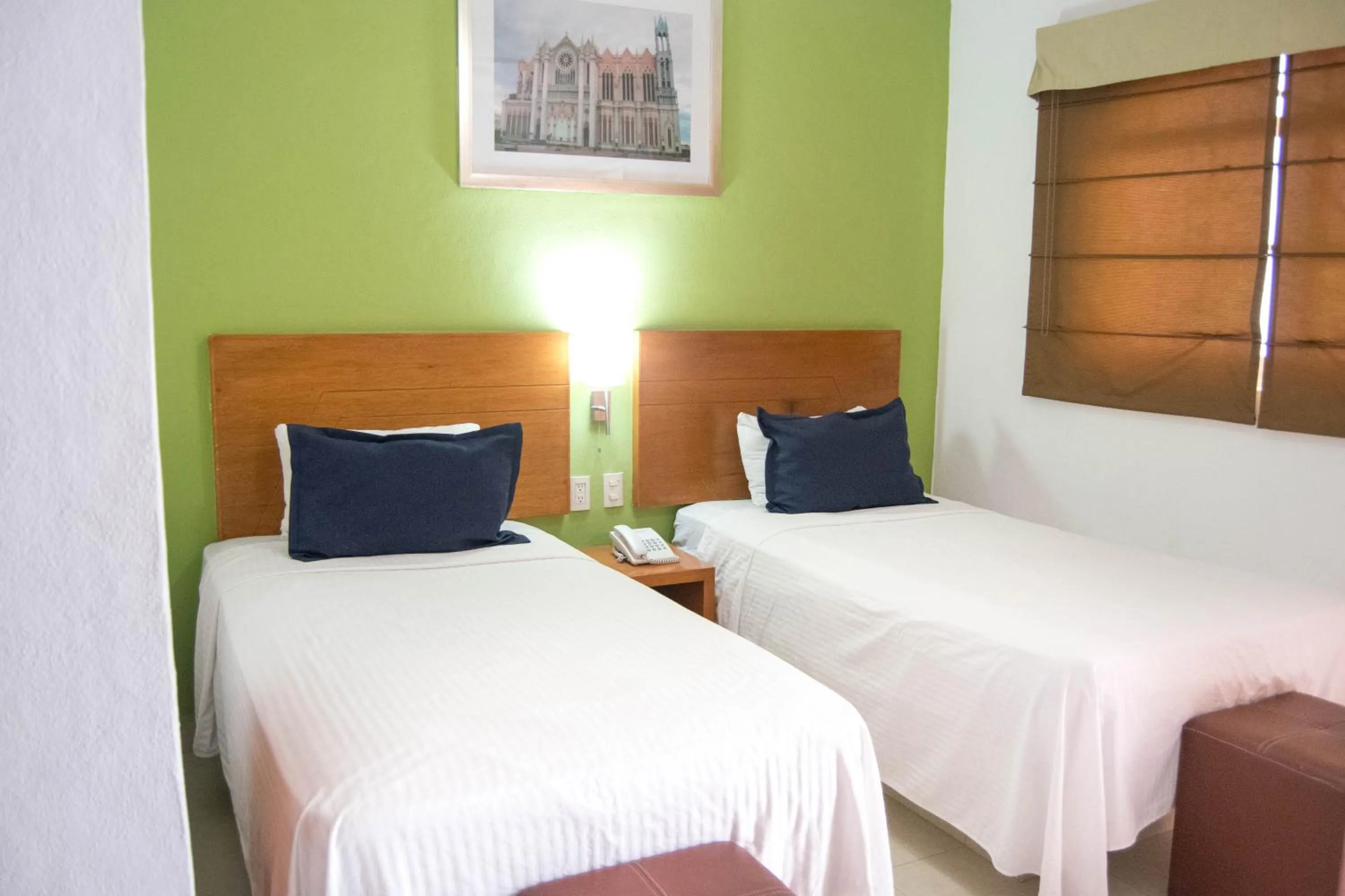 Bed in Hotel River Poliforum