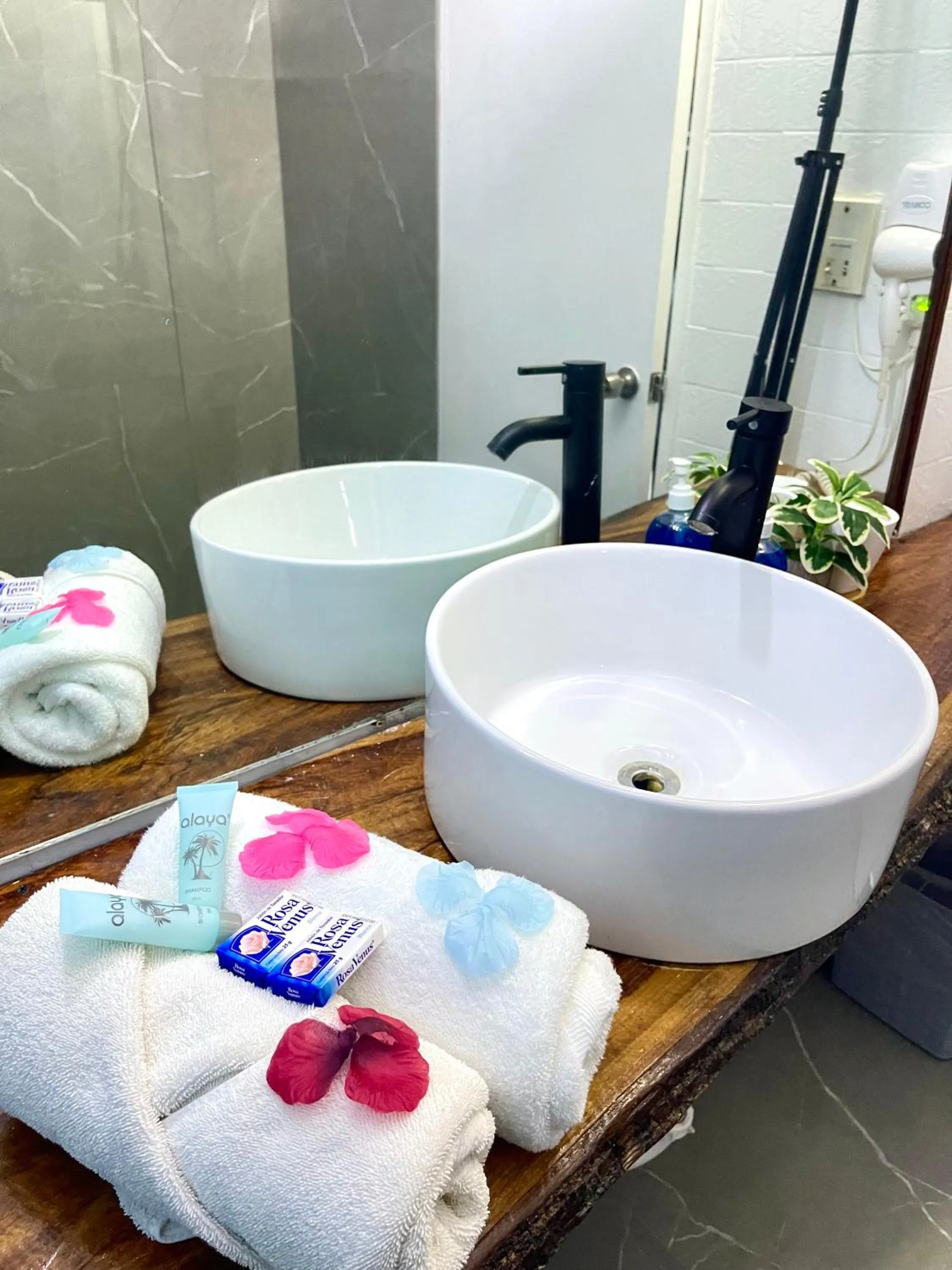 Bathroom in Sand and Tan Beach Hotel
