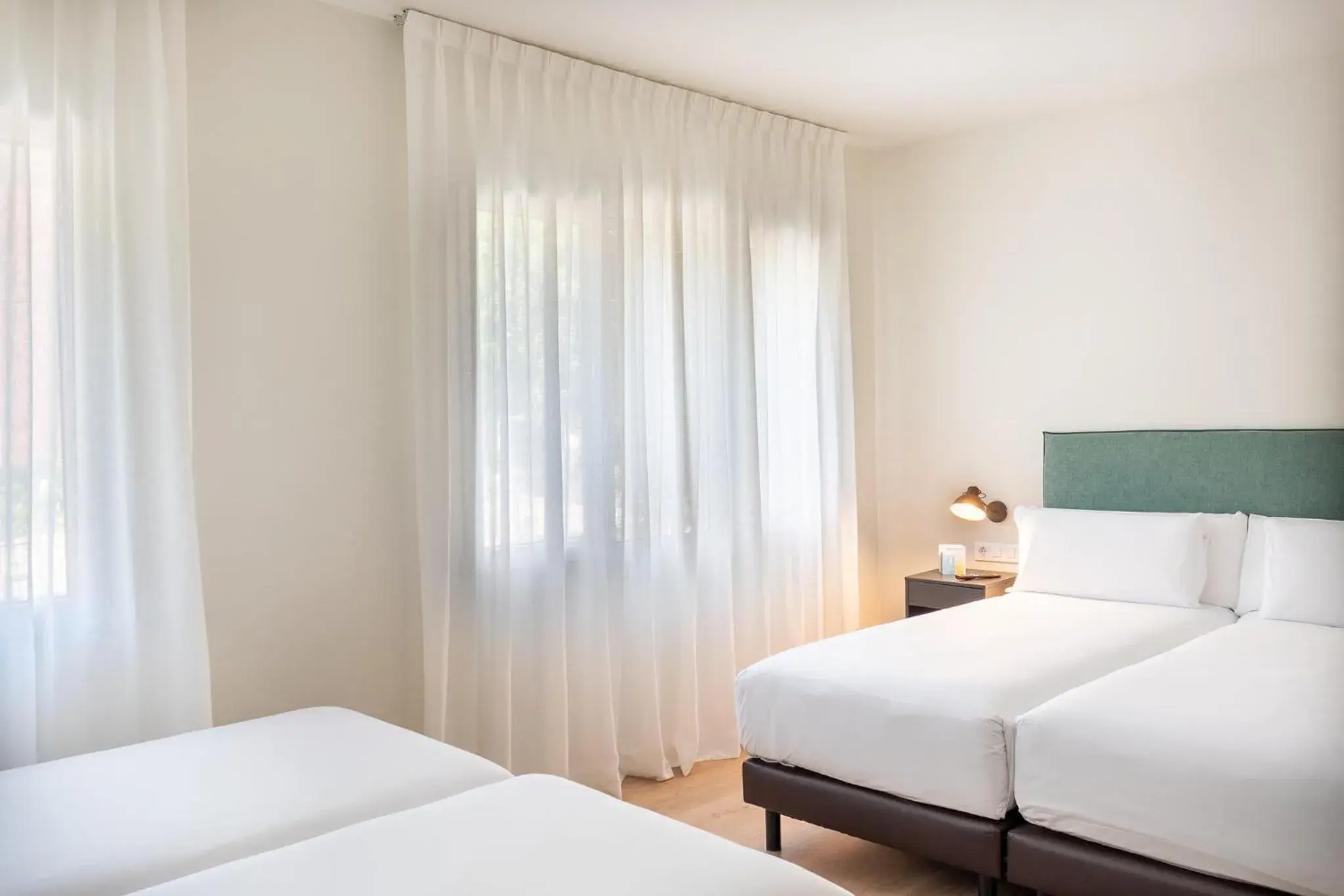 Quadruple Room in Tres Torres Atiram Hotel Quadruple Room in Tres Torres Atiram Hotel