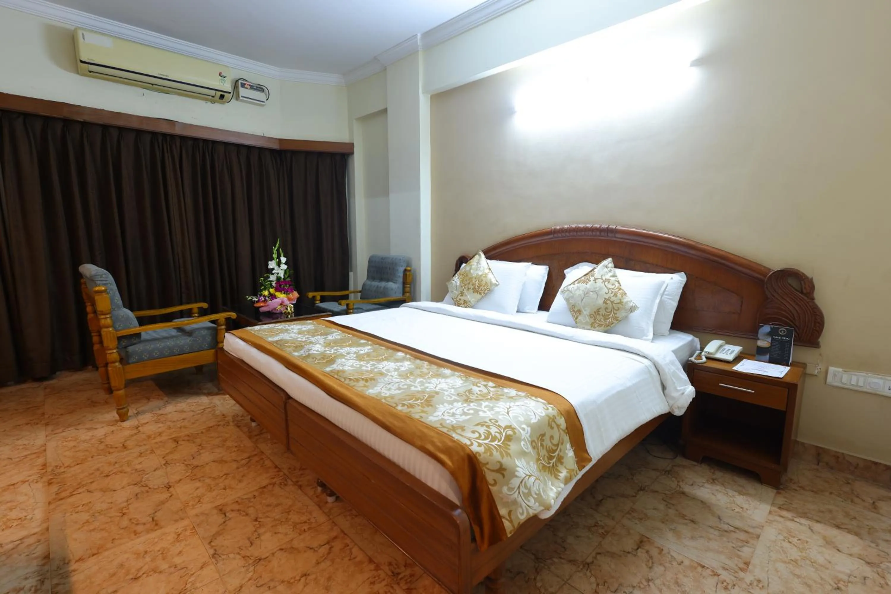 Seating area, Bed in Hotel PLR Grand