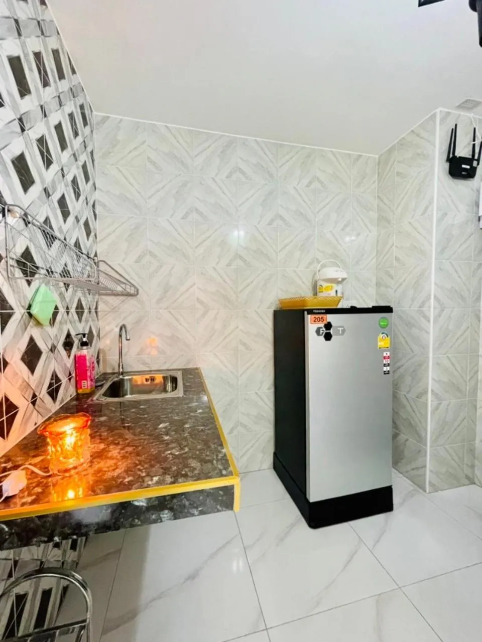 Kitchen or kitchenette in โรงแรมเรือนคุณเล็ก กานต์สินี