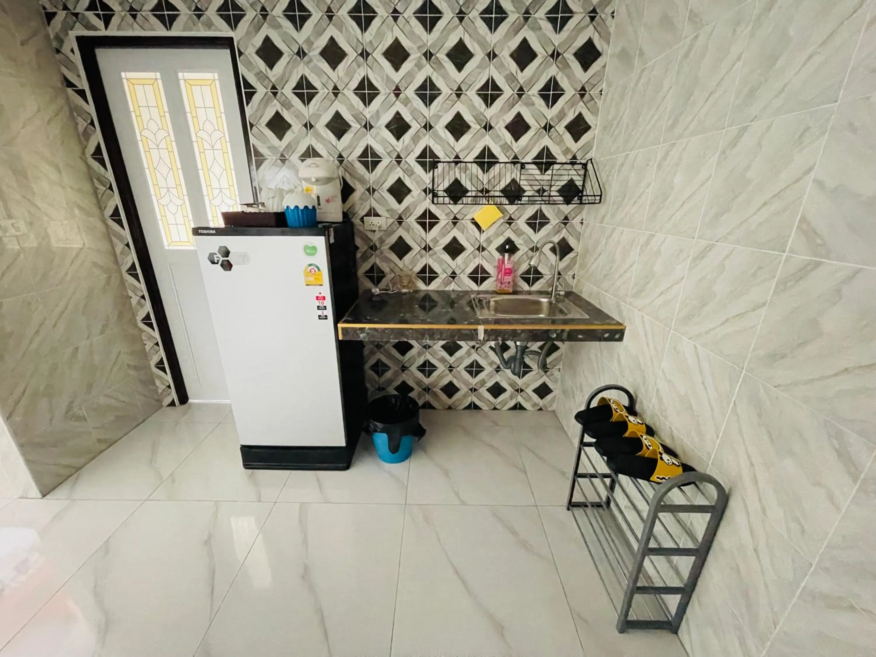 Kitchen or kitchenette in โรงแรมเรือนคุณเล็ก กานต์สินี