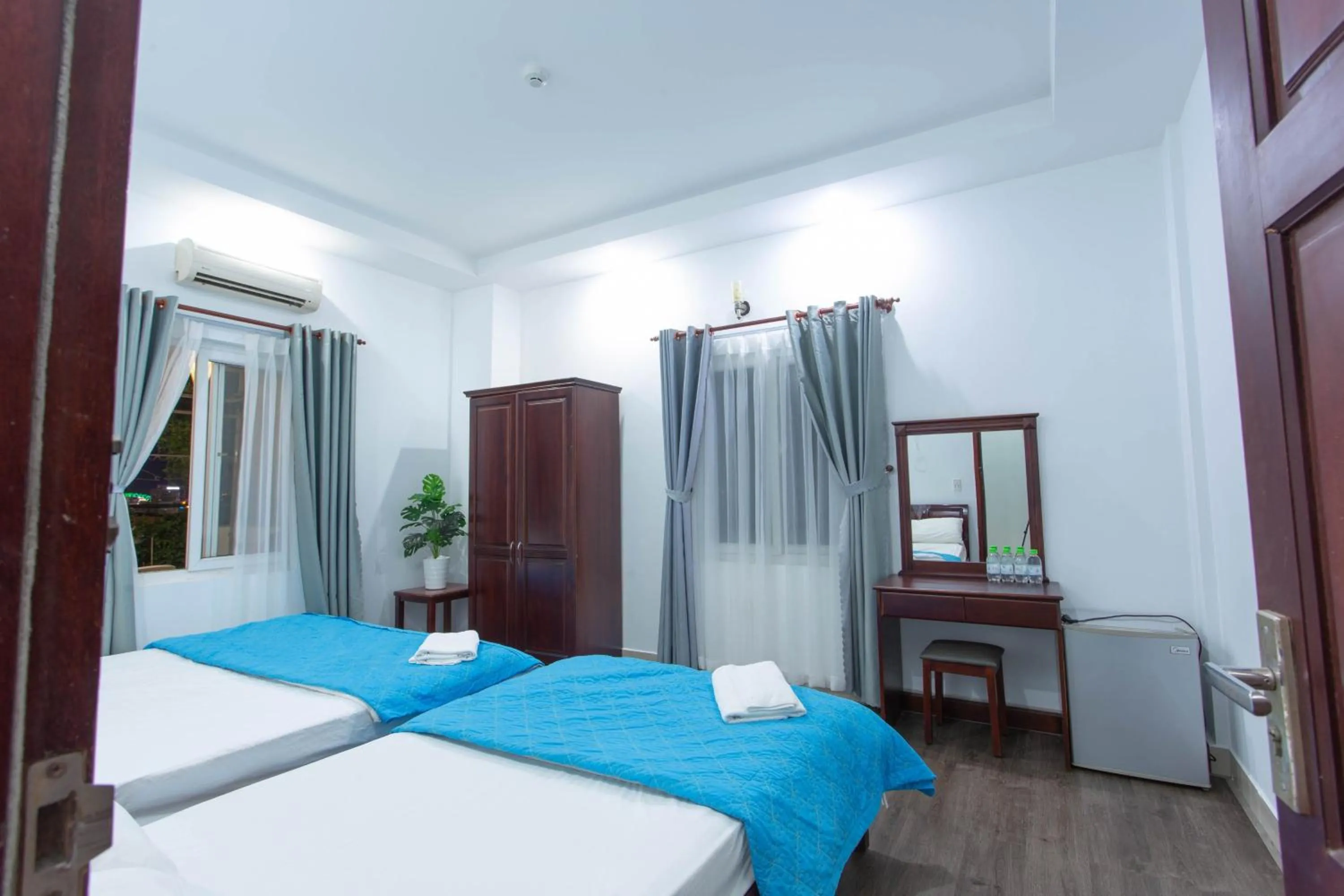 Bed in SKY APARTMENT & HOTEL