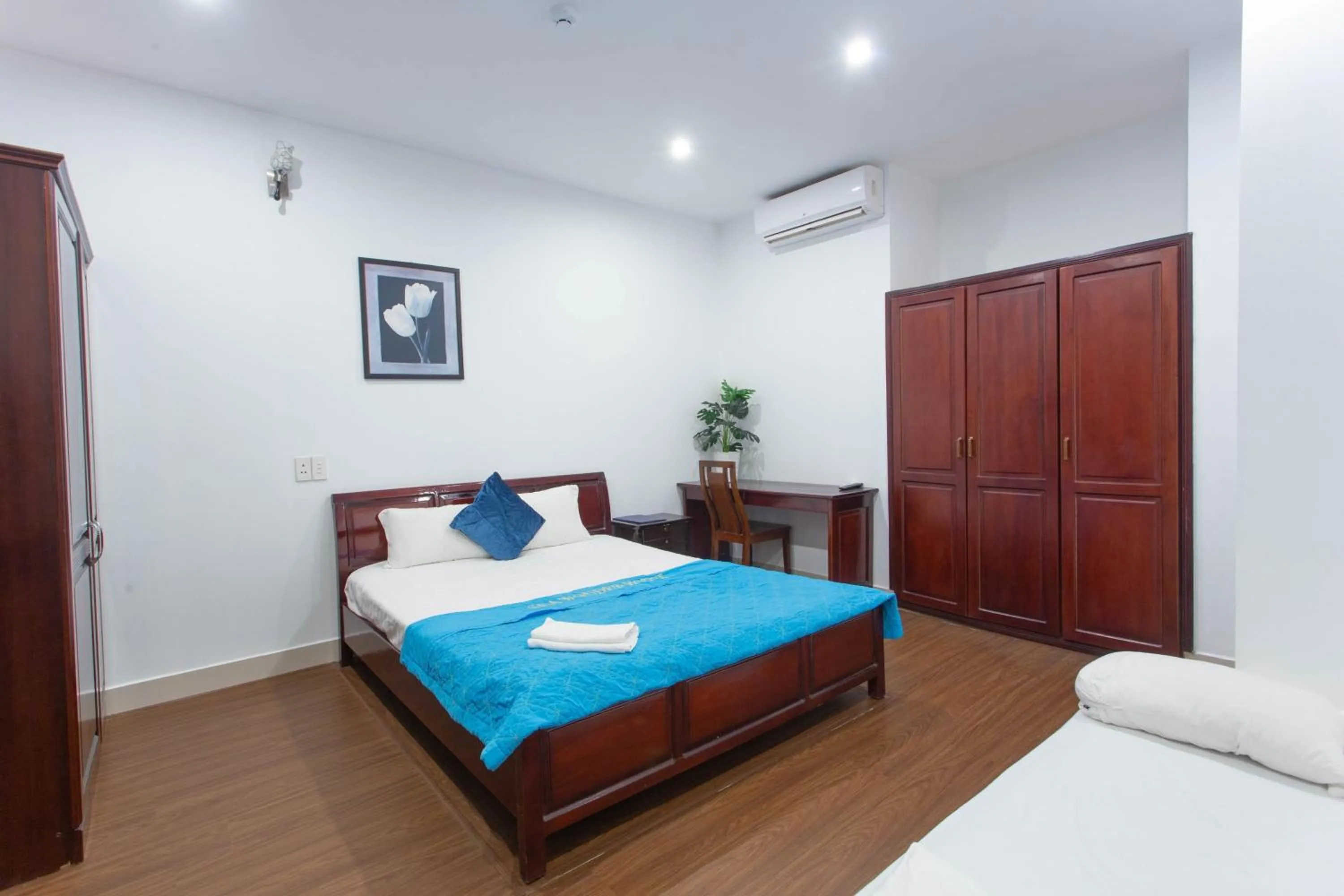 Bed in SKY APARTMENT & HOTEL