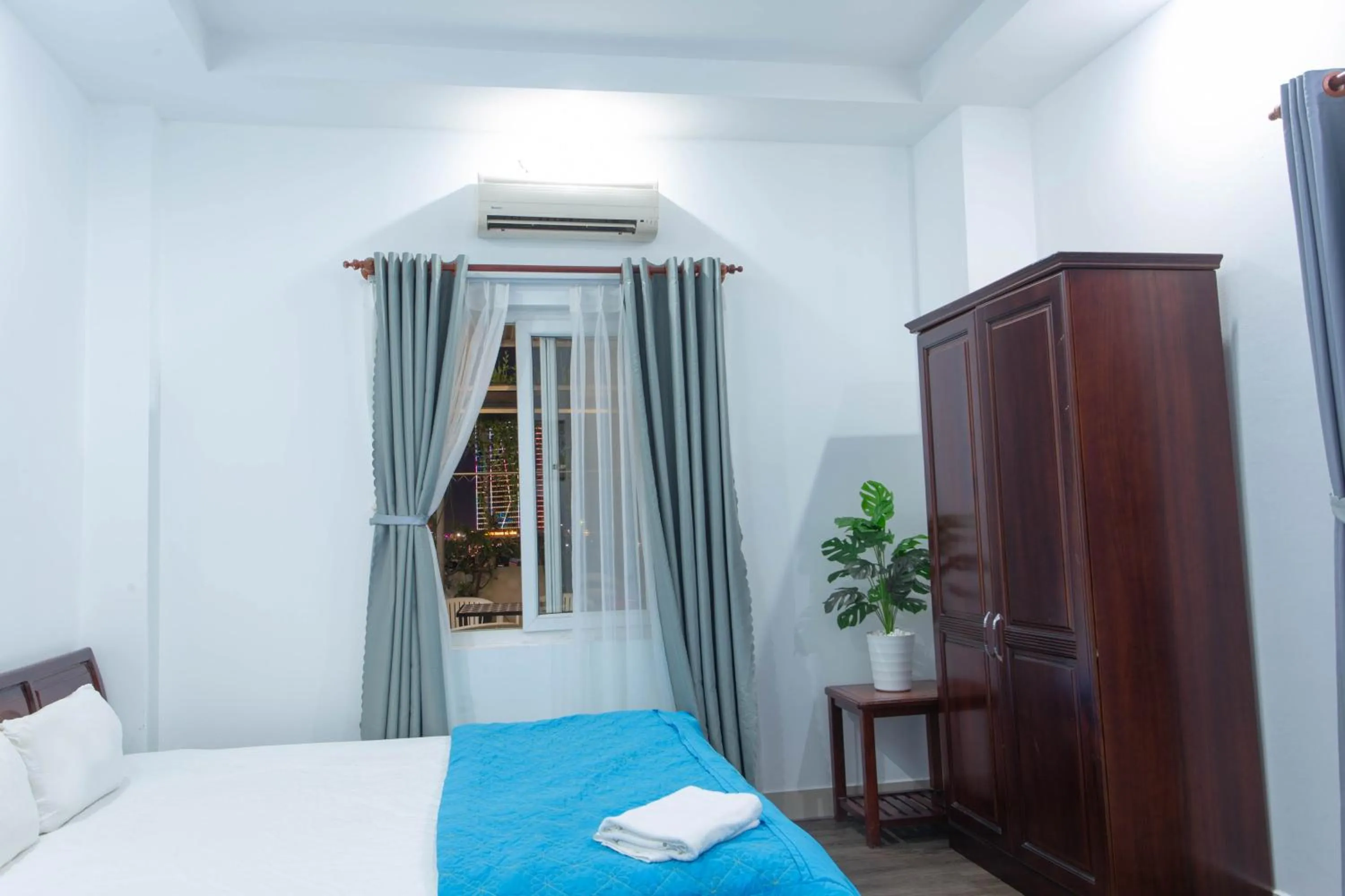 Bed in SKY APARTMENT & HOTEL