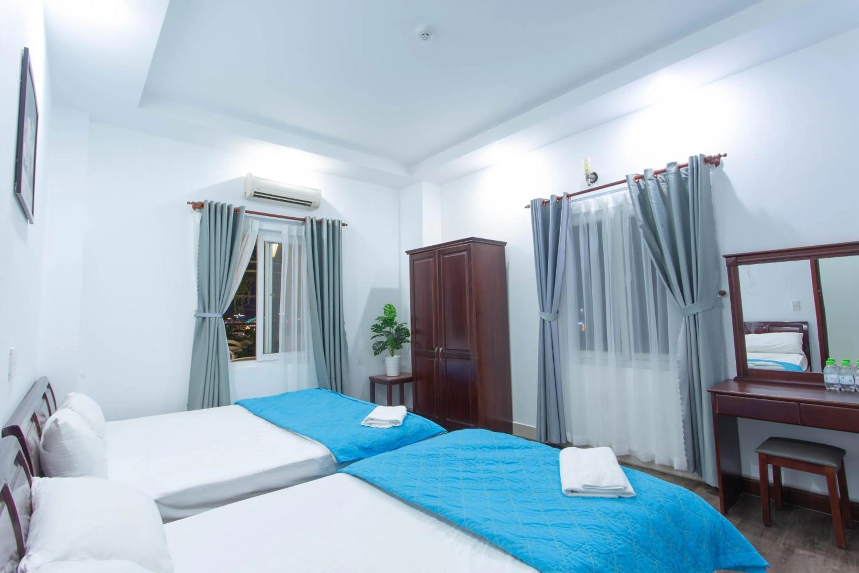 Bed in SKY APARTMENT & HOTEL