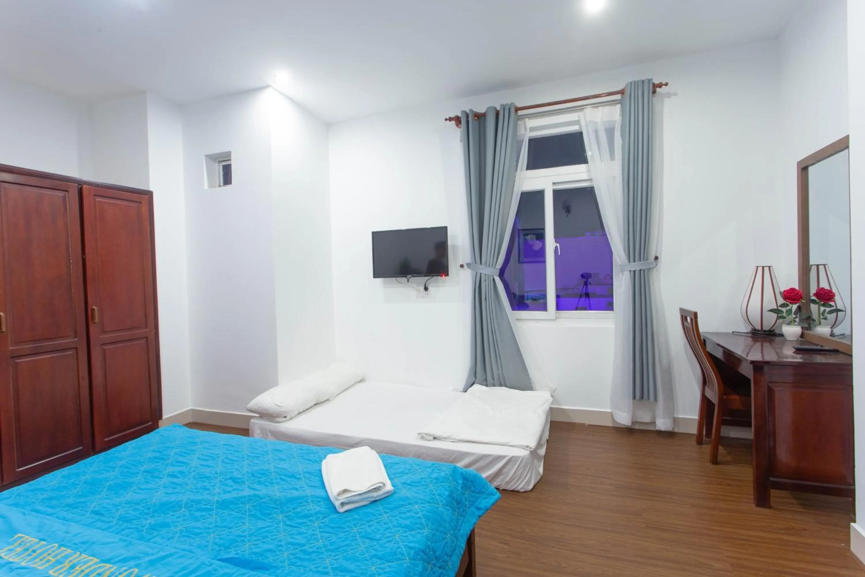 Bed in SKY APARTMENT & HOTEL