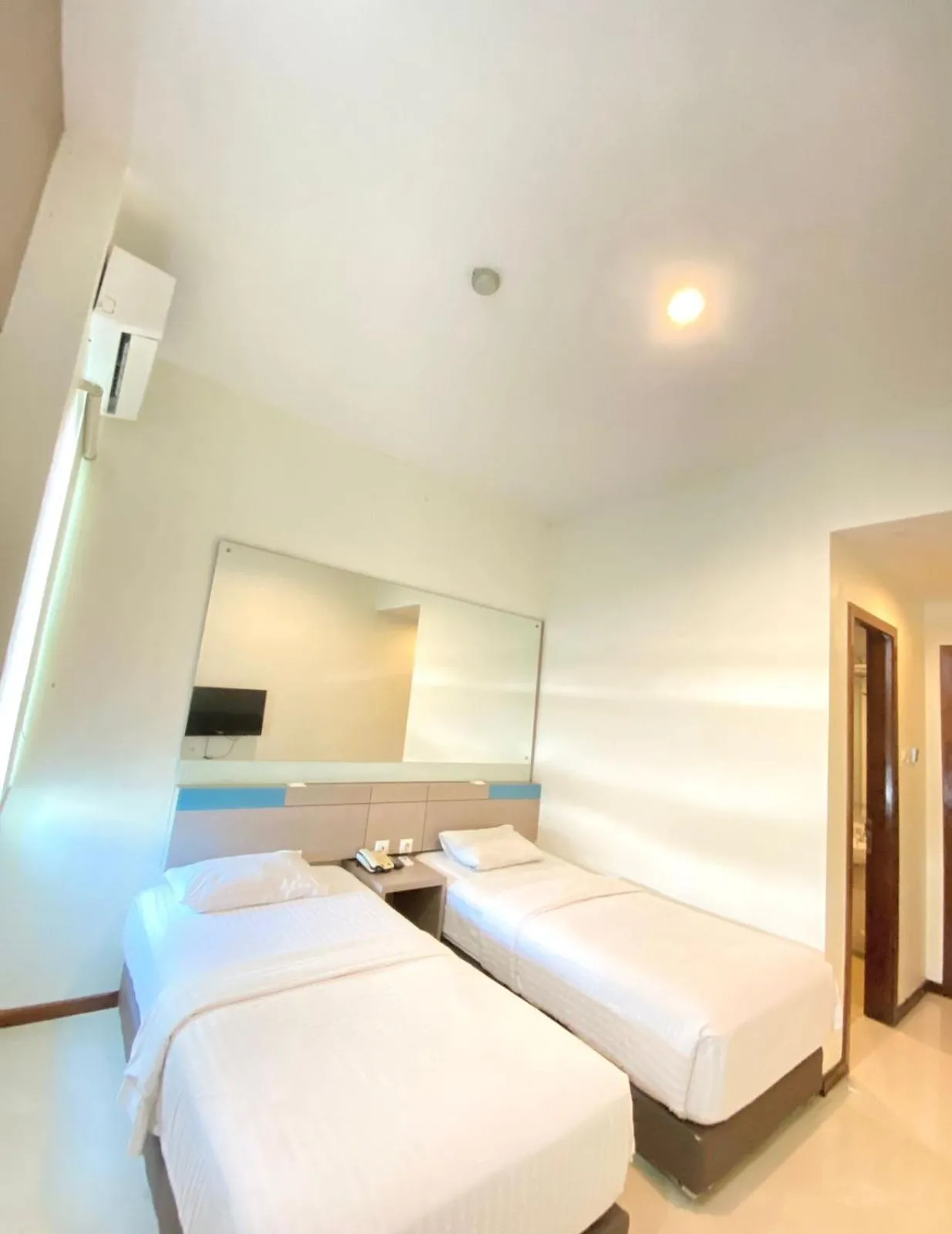 Bed in Putra Mulia Hotel Medan