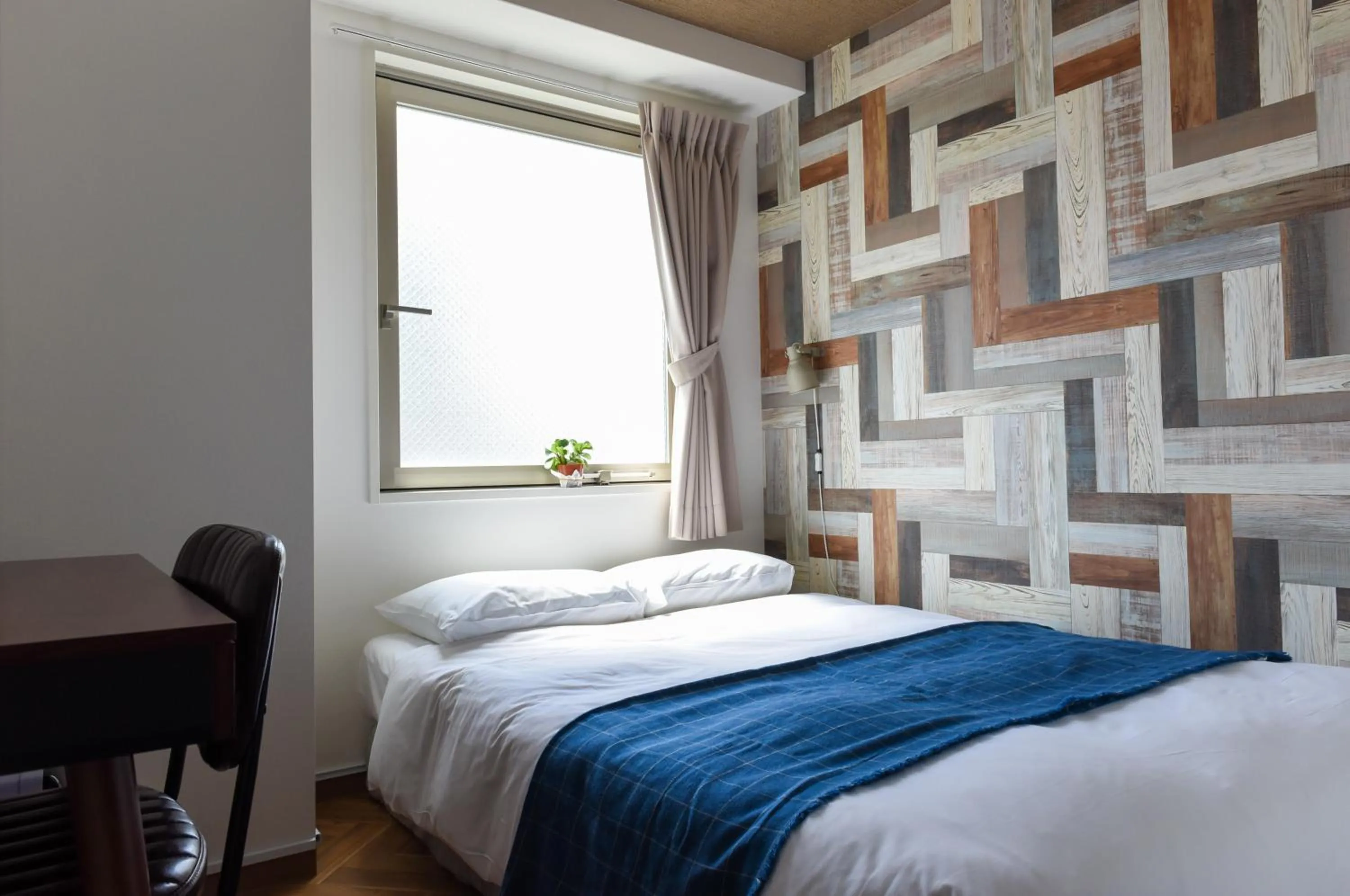 Bed in HOTEL WAN OSAKA EBISU