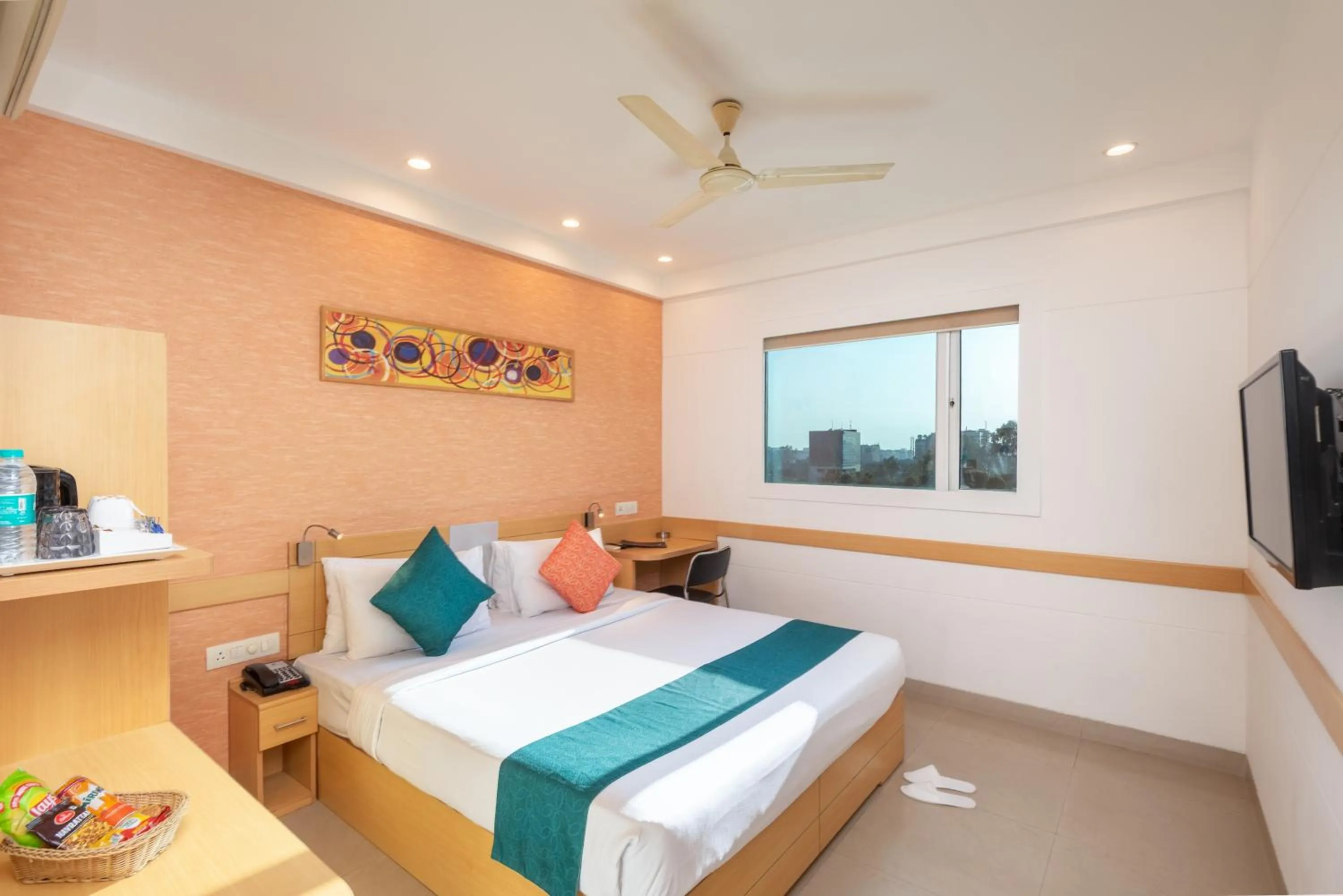 Bed in Mango Grove Hotel