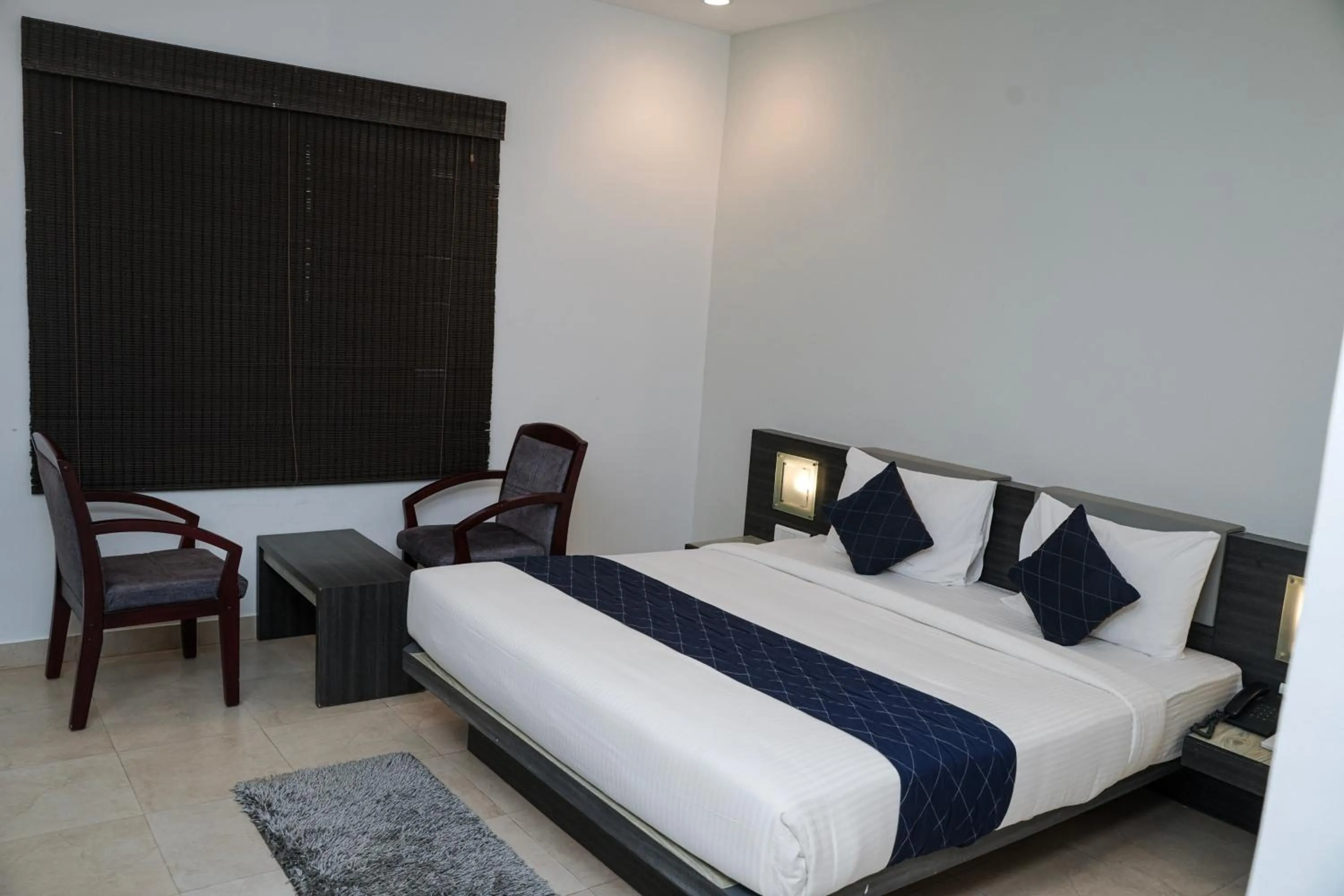 Bed in Hotel Palm shore