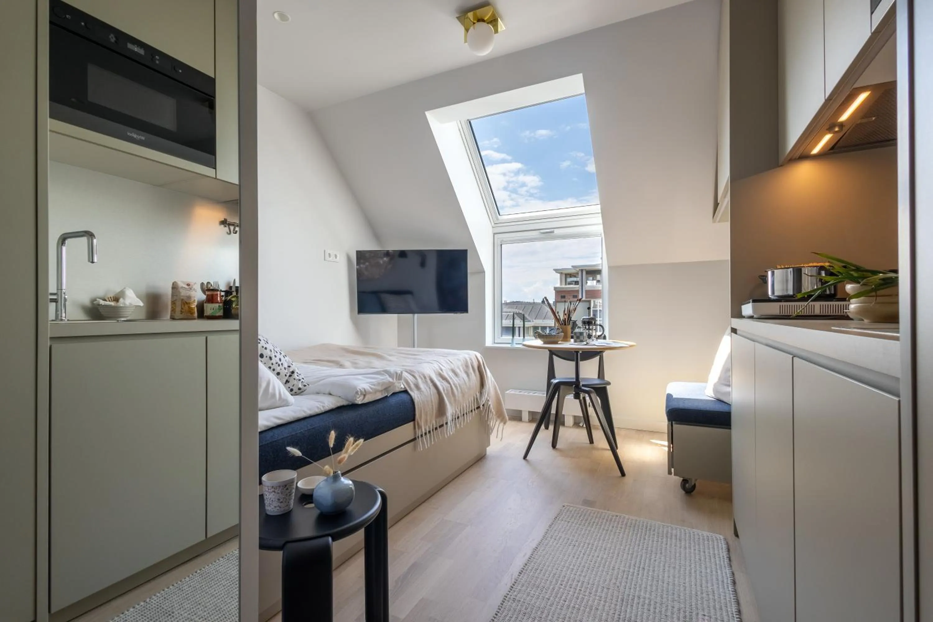 Bed in Unity Malmö - A Studio Hotel