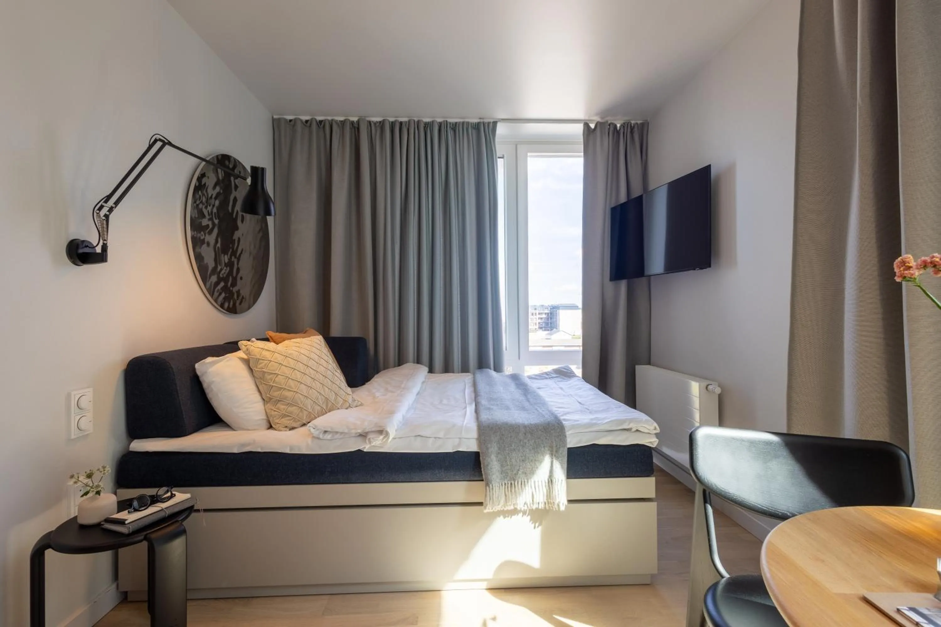 Bed in Unity Malmö - A Studio Hotel