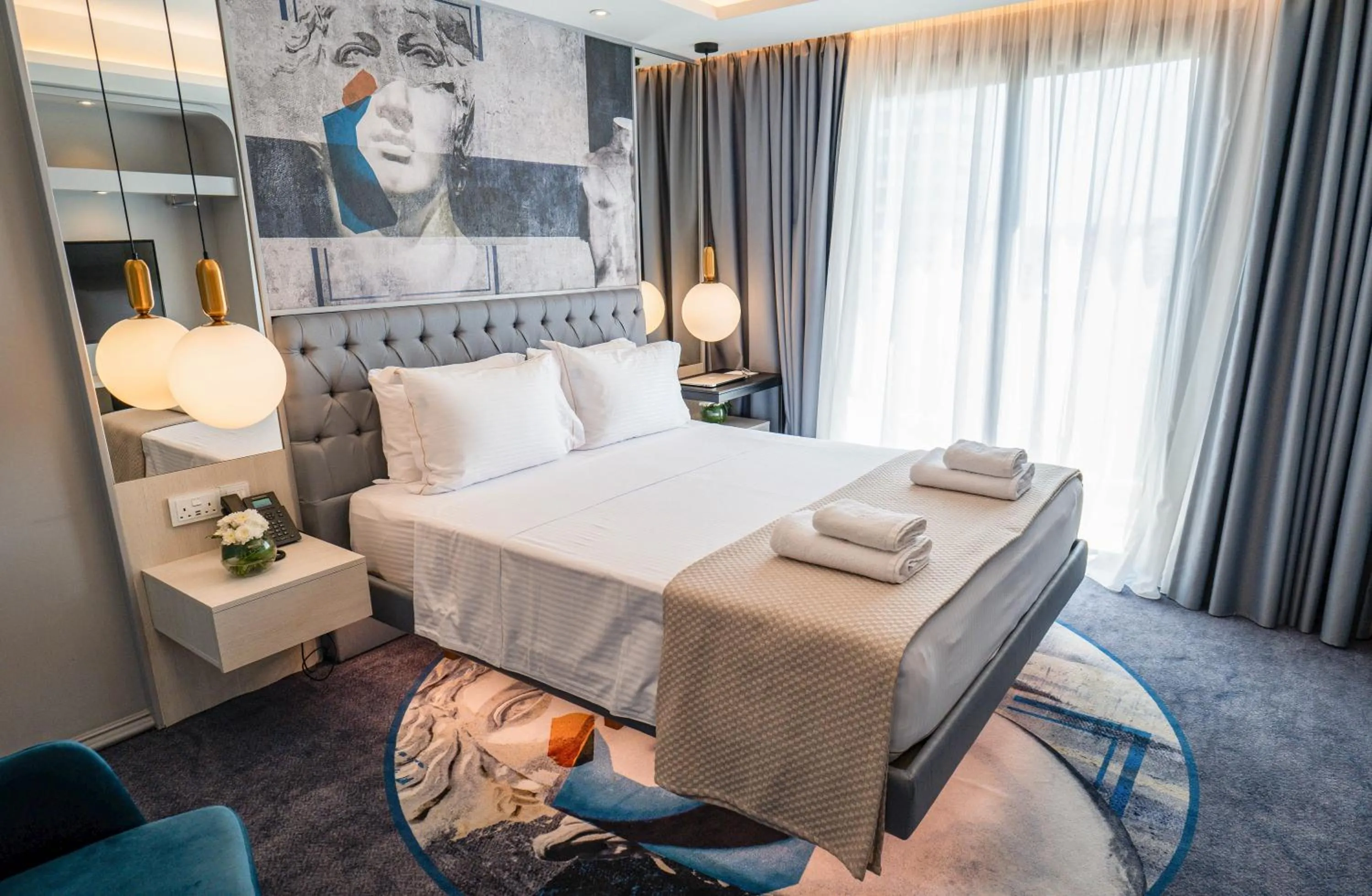 Bed in Gate Twenty Two Boutique Hotel