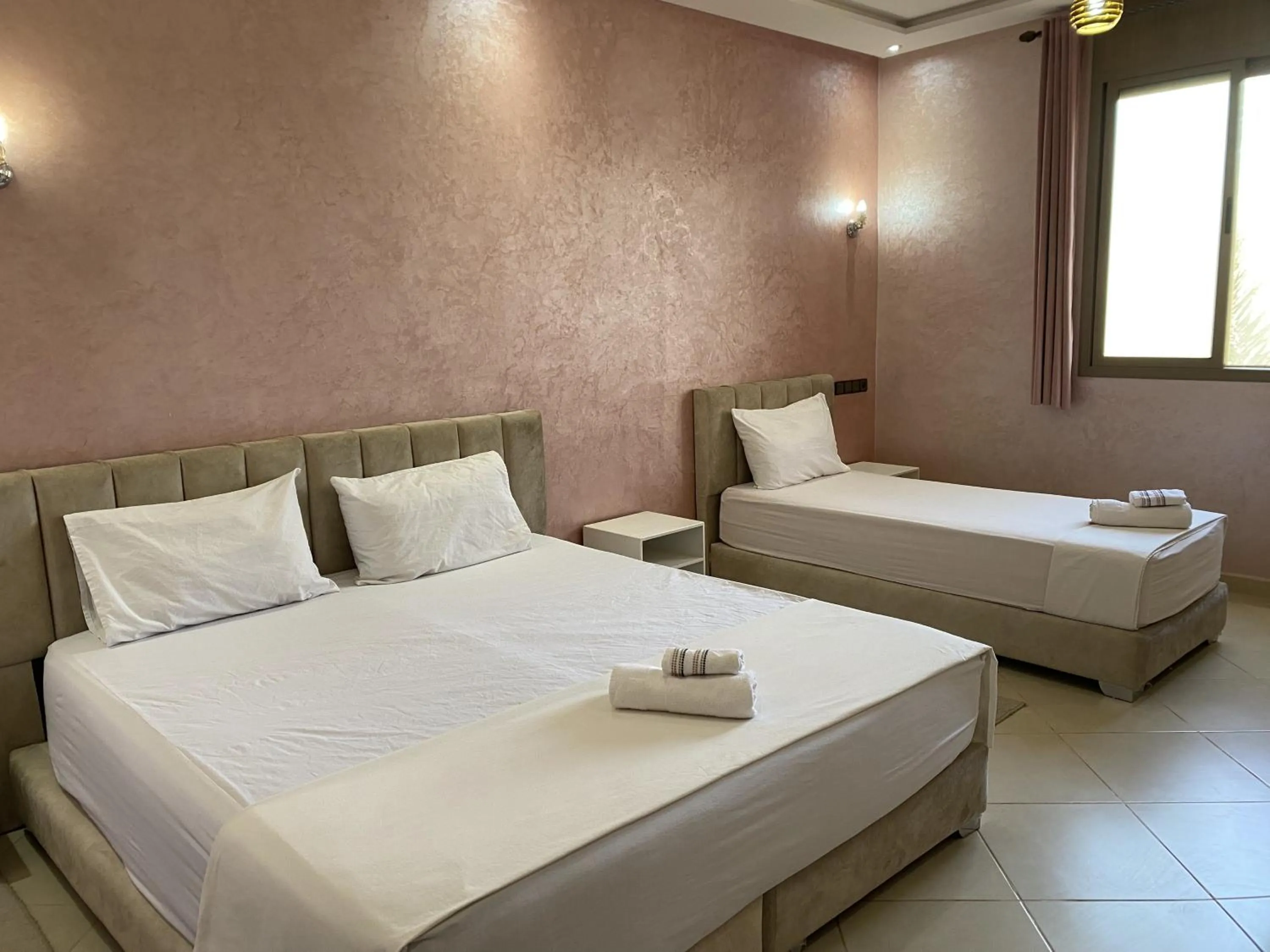 Bedroom, Bed in IGHIZ INN resort