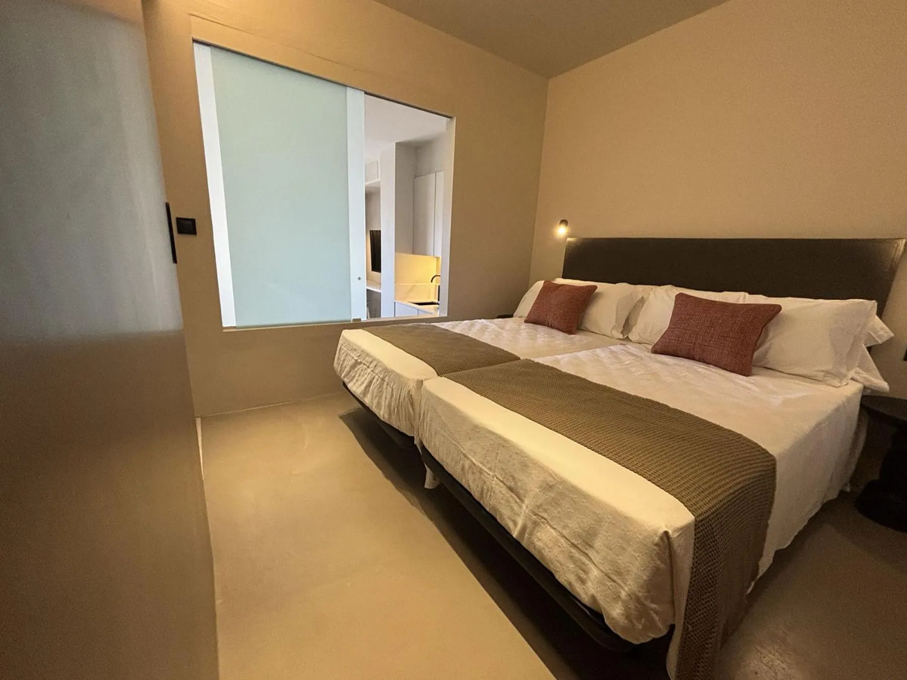 Bed in Senator Barcelona Apartments