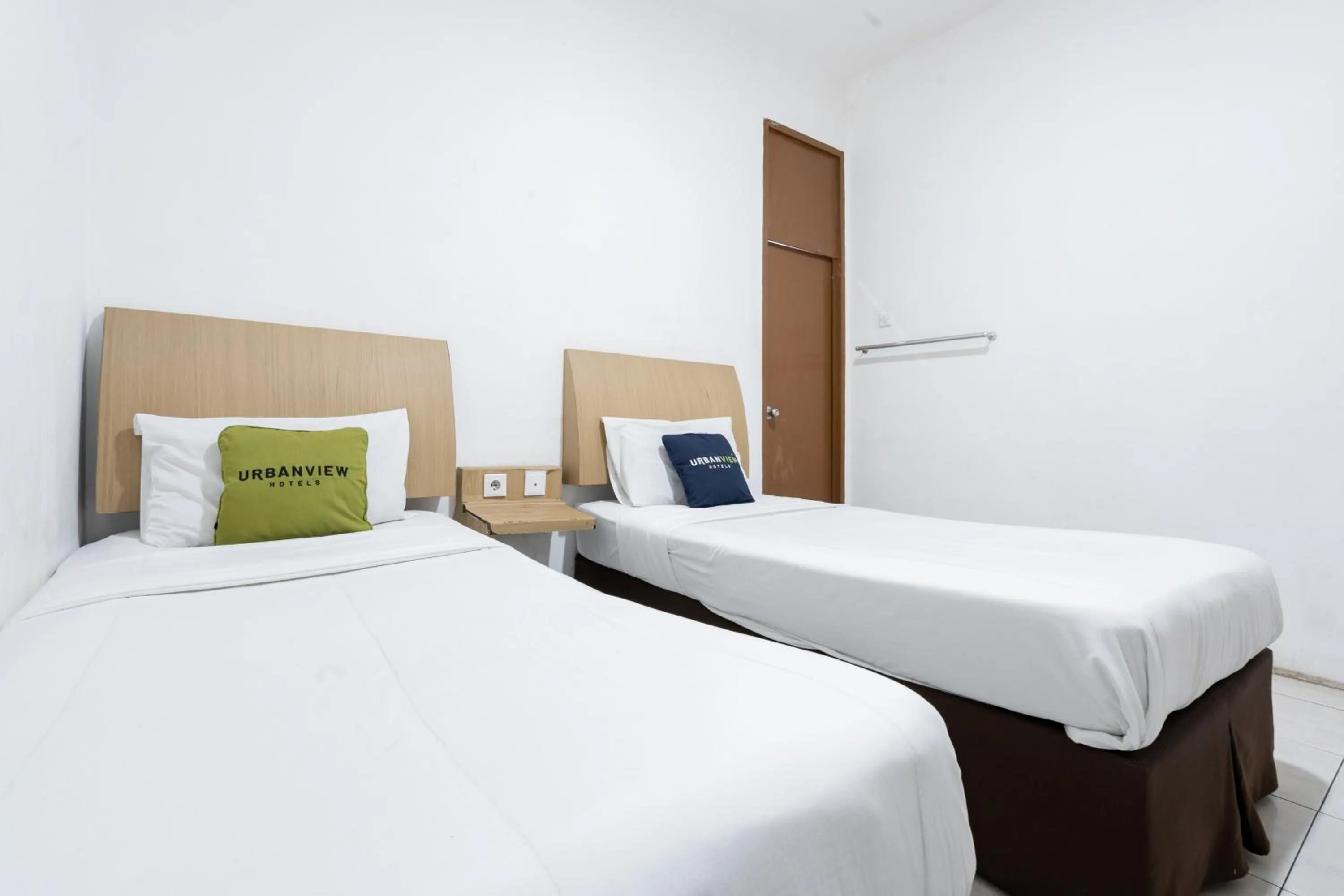 Bedroom, Bed in Urbanview Hotel Cozy Samarinda by RedDoorz