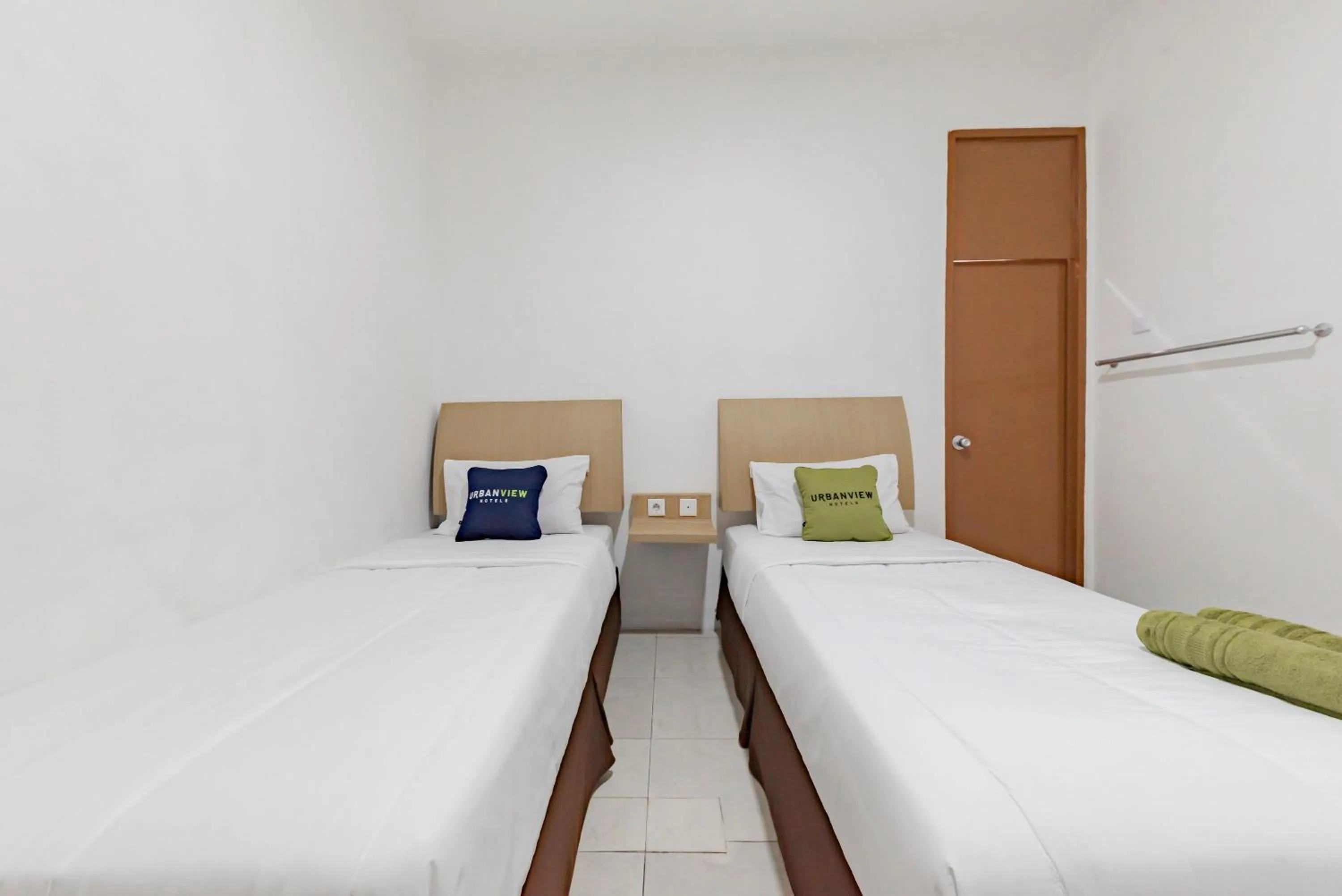 Bedroom, Bed in Urbanview Hotel Cozy Samarinda by RedDoorz