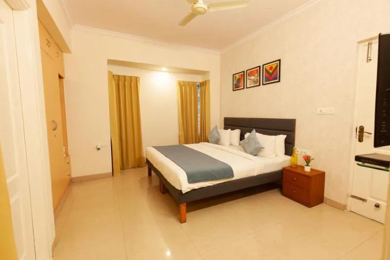 Bed in Iris Comforts Sharing service apartment